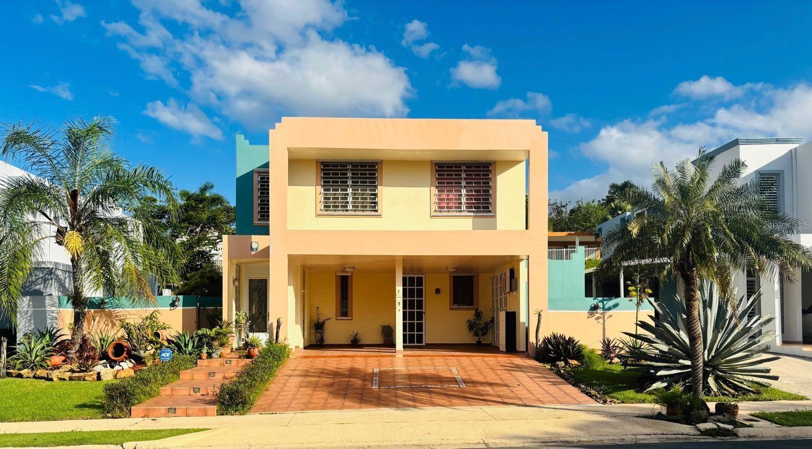 Your new home awaits at Vistas de Río Grande I—don’t miss this excellent opportunity to invest in a spacious two-level property ideal for comfort. The home features 4 bedrooms, 2.5 bathrooms, living room, dining room, family room, a large kitchen, terrace, double carport, laundry area, and storage space, all on a 570.00 square meter lot. It comes fully equipped with a water cistern, leased solar panels with a Tesla battery, a solar water heater with two panels, four air conditioning units, ceiling fans, and appliances including a stove, refrigerator, and washer. The community offers controlled access and 24/7 security, plus recreational amenities such as a swimming pool and basketball court, with an HOA fee of $88. It may qualify for a Rural loan (certain restrictions apply) and is conveniently located just 5 minutes from the Belz Outlets in Canóvanas, Route 66, and 20 minutes from Luis Muñoz Marín International Airport, near popular tourist attractions. A pre-qualification letter and/or proof of funds is required to schedule a showing—don’t miss out on this great opportunity.