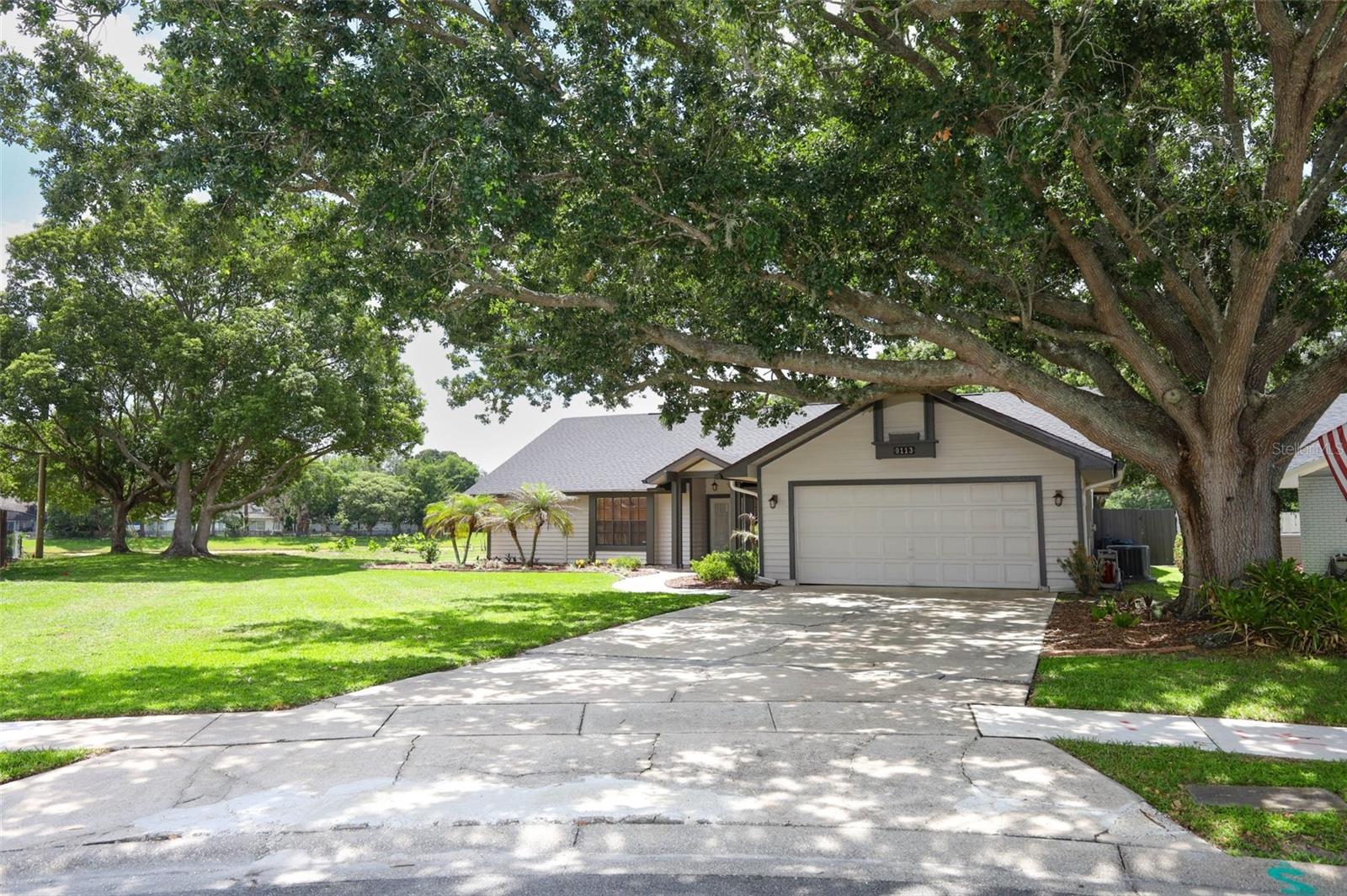 Gorgeous and Immaculate 4BR/3BA Deerwood Pool Home on a Private Cul-de-Sac! Welcome to this beautifully maintained home featuring an Impressive sparkling Screened Pool overlooking a serene, tree-lined backyard with tranquil nature views and two picturesque ponds! Nestled on a quiet cul-de-sac lot, this exceptional property offers outstanding Privacy, while the Expansive Pool Deck provides the perfect setting for entertaining family and friends, or relaxing on peaceful Florida evenings! Light, bright, and impeccably maintained, this home is truly move-in ready with numerous recent updates, including a new roof (2026), newly refinished Pool surface, Pool deck, and Screen enclosure (2025), new exterior Paint (2024), and whole-house Replumbing (2020). Spacious Open floor plan features elegant formal living and dining rooms, a private Office with French doors, and a desirable Split-bedroom layout** Luxurious Primary suite offers sliding glass doors to the pool, a generous Walk-in closet, and a completely remodeled Spa-inspired Bath featuring a double Quartz vanity, Porcelain tile floors, and a stunning frameless Glass walk-in shower. A separate Guest suite includes its own private Bathroom and direct access to the pool, making it an ideal retreat for In-laws or overnight guests** Beautifully appointed Kitchen boasts rich Wood cabinetry, Granite countertops, Stainless steel appliances, a center Island with Breakfast Bar, a large walk-in Pantry, and charming corner windows above the sink that showcase peaceful backyard views** Kitchen flows seamlessly into the inviting Family room with vaulted ceilings and sliding doors opening to the Pool and lanai, creating the perfect indoor-outdoor lifestyle** This exceptional Deerwood home combines thoughtful updates, timeless style, and an outstanding location to create a truly special place to call home. Beautiful neighborhood with low HOA fee, only $105/yr. DEERWOOD is convenient to downtown, OIA, Lockheed Martin, UCF, and Valencia State College**Just minutes to popular Waterford Shops and Restaurants**Easy access to 408 and 417**Close to public RIO PINAR GOLF/COUNTRY CLUB, which is open to the public, with golf and other activities, just minutes away**You'll love this home!!