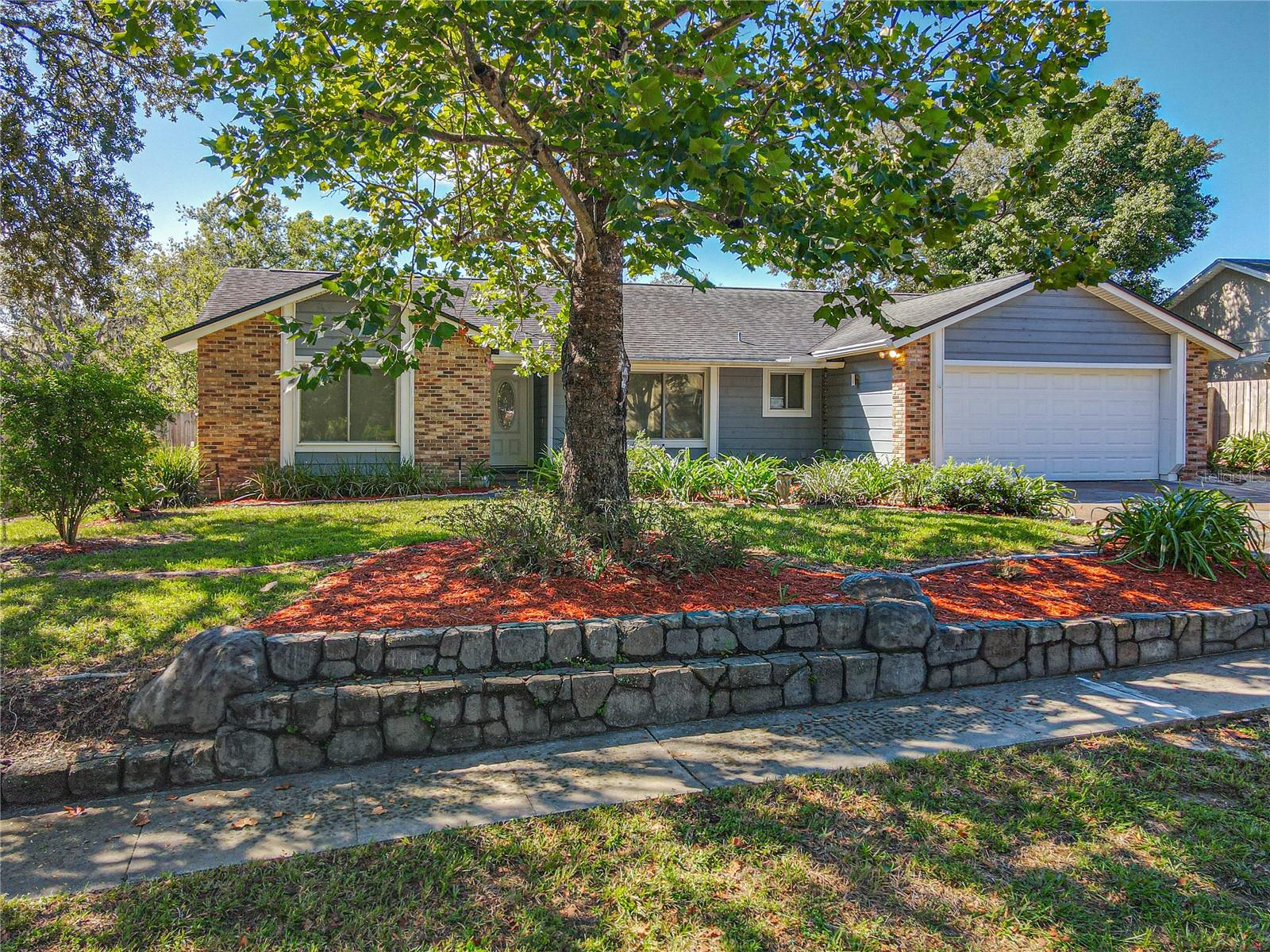 Reduced!! Beautiful Pool Home in Wekiva! This 3bed/2bath Split Plan home features Wood Plank and Ceramic Tile throughout, Vaulted Ceilings & a Brick Fireplace in the Living Room with French Doors leading to the Back Porch/Sunroom, a separate Dining Room, a Spacious Eat-in Kitchen, and an Updated Guest Bath with Quartz counters. The Large Master Bedroom features Vaulted Wood Plank Ceilings, Sliding Doors that lead to the Porch/Sunroom, and a Walk-in Closet. The Saltwater Pool comes with a new pump and pool sweep for easy maintenance. The Washer, Dryer & Refrigerator in the garage are included. Come enjoy the wonderful community of Wekiva with miles of walking trails, multiple parks/playgrounds, tennis courts, pickleball courts, and more!