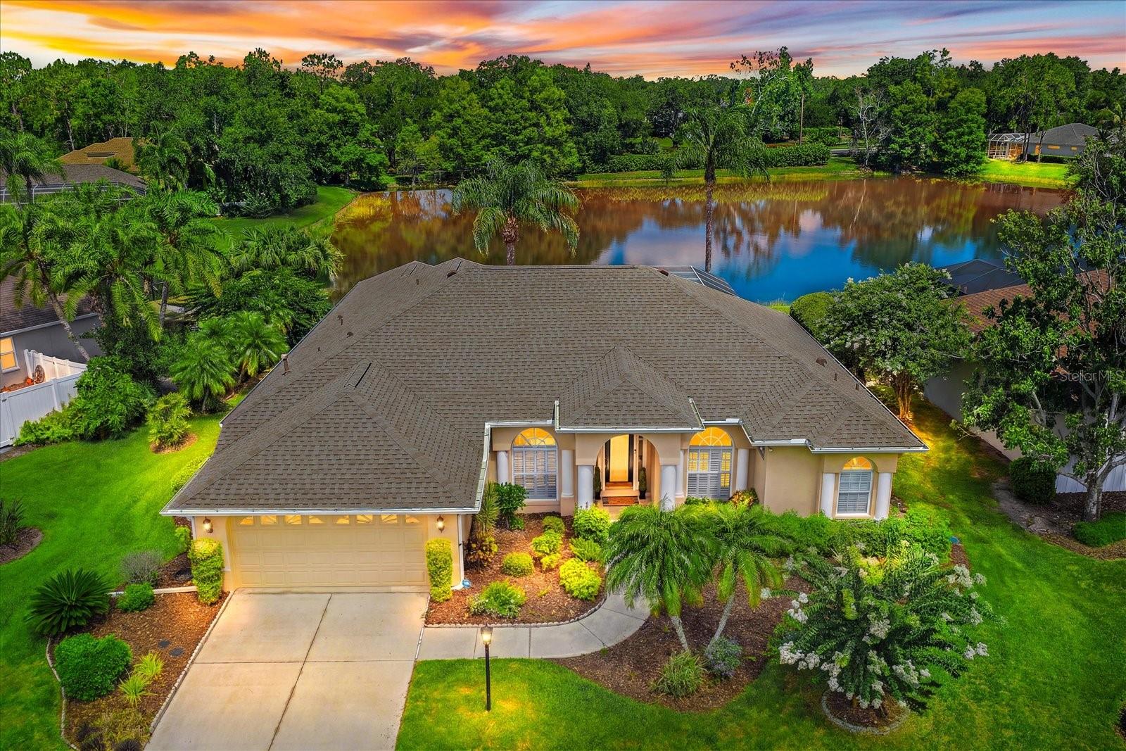 LOCATION, LOCATION, LOCATION! Nestled in the highly sought-after Summerfield Glades ~ the heart of Lakewood Ranch, this beautifully updated pool home offers stunning lake views, an open floor plan, and an impressive list of OVER $120,000 in upgrades throughout.

Recent Improvements Include:
•NEW ROOF (2018)
• POOL LINER AND TILE UPDATES (2015)
• CUSTOM LANAI PAVERS (2015)
• NEW GUTTERS (2020)
• EXTERIOR PAINT (2020)
• NEW WATER HEATER (2021)
• COMPLETELY REMODELED KITCHEN WITH CUSTOM CABINETRY AND QUARTZ COUNTERTOPS (2022)
• LUXURY VINYL PLANK FLOORING (2022)
• PLANTATION SHUTTERS THROUGHOUT (2023)
• INTERIOR PAINT (2025)
• COMPLETELY REMODELED PRIMARY BATHROOM (2025)
• UPDATED GUEST BEDROOM FLOORING AND BASEBOARDS (2026)
• CUSTOM WINDOW TREATMENTS
• UPDATED LIGHTING FIXTURES
From the moment you arrive, pride of ownership is evident. The open floor plan is designed for comfortable everyday living and effortless entertaining while showcasing breathtaking views of the lake and pool.

The completely remodeled kitchen is the true centerpiece of the home, featuring gorgeous custom cabinetry, stunning quartz countertops, abundant storage, and a spacious breakfast bar overlooking the main living areas. This beautiful space seamlessly connects to the dining and living areas, making it ideal for gathering with family and friends.

The split-bedroom floor plan provides privacy for family and guests, while the spacious primary suite serves as a relaxing retreat featuring a gorgeous, completely remodeled spa-inspired bathroom with custom finishes and an oversized walk-in shower.

This move-in-ready home offers the ideal Lakewood Ranch lifestyle in the highly sought-after Summerfield Glades.
Enjoy unparalleled access to walking and biking trails, Heron's Nest Nature Preserve, and Summerfield Park. This community features tennis and pickleball courts, baseball and soccer fields, dog parks, playgrounds, and a community pavilion for gatherings and events. With an incredibly low HOA of just $102 per year, you'll enjoy all the benefits of living in Lakewood Ranch, the #1 Master-Planned Community in the USA. Conveniently located near I-75, top-rated schools, world-class dining, shopping, and entertainment, and just 30 minutes from Sarasota's world-famous beaches. Don't miss this opportunity to own a beautifully updated home with spectacular lake views and LIVE ON VACATION NOW!