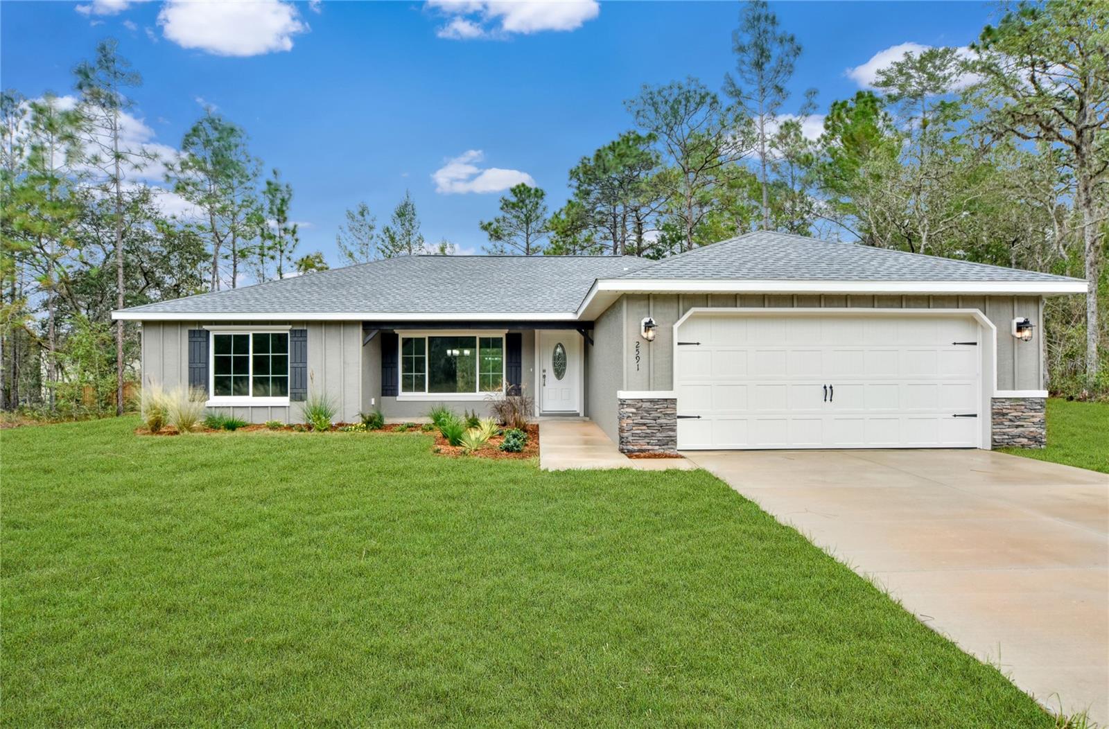 CONSTRUCTION COMPLETED!!   MOVE IN READY!!   This 3/2/2 home is Custom Built and Gorgeous. Located on a Great lot in a quiet area, close to shopping, schools, and more! This home features a beautiful and custom exterior with a big front porch just waiting for some rocking chairs. Inside the home features a large open floor plan, shaker style cabinets with soft-close, hardware, a stainless appliance package, An under-mount SS Sink, 3 CM Granite counter tops and a walk-in pantry for plenty of storage. 5" baseboards, luxury vinyl plank flooring throughout the home. You will love the large master bedroom with walk-in closet, dual sinks AND GRANITE COUNTERS in the master bath, a floor to ceiling tiled in shower with high-end frameless glass shower doors. The other side of the home has 2 large bedrooms with large closets and the guest bathroom with GRANITE COUNTER AND a beautifully tiled in tub. Home has so many upgrades to help with future electric bills, AC with Heat Pump, Low E Argon Gas vinyl windows, extra high end insulation throughout the walls, attic and garage. A 40 Gallon energy efficient hot water heater, Energy efficient heat pump, upgraded Kensington Oval Glass Front door and 3 exterior hose bibs. Under Truss 10 X 16 covered rear patio! Builder offers a full 1-year warranty plus a proper 3rd party 10-year structural warranty. This custom home is the one you've been waiting for and no short cuts were taken when built! Anything you need within 10/15 minutes of this country setting home! 
New Shopping center also under construction with a Target, Aldi, Starbucks, Panera , 7 Eleven and Texas Road House.