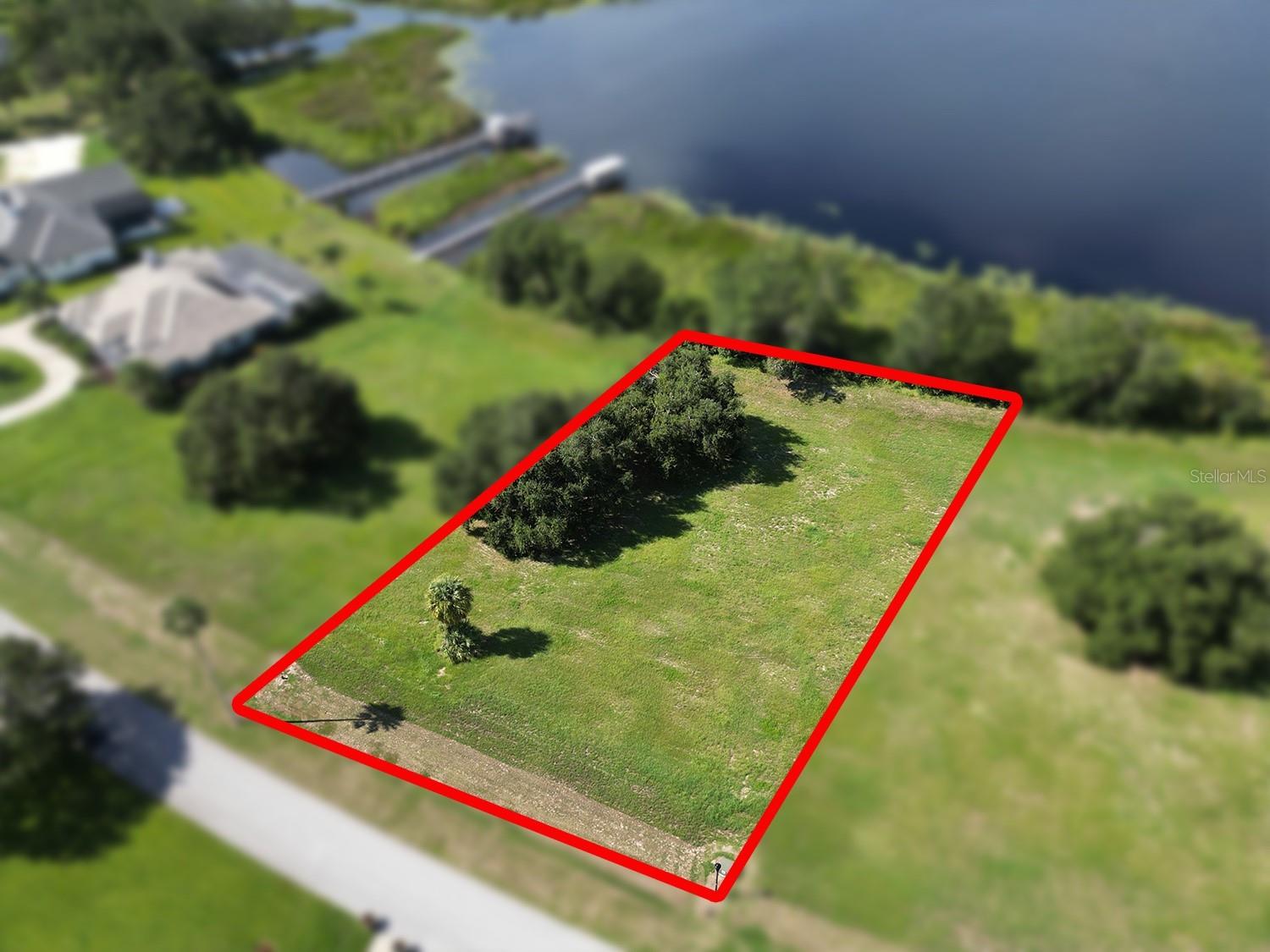 Take advantage of a 1% of the loan amount lender credit towards buy downs or closing costs when utilizing seller's preferred lender. BACK ON MARKET!  Discover the perfect opportunity to design and build your dream home on this exclusive waterfront lot in the prestigious gated community of Garden City. Nestled along the shores of Cherry Lake, Lot 15 offers direct water access with the ability to build your own private dock—ideal for boating, fishing, and enjoying breathtaking lakefront sunsets.
With utilities already run to the front of the site, you’ll save time and money when beginning your custom build. Garden City is known for its luxury standards, with a minimum 3,800 sq. ft. requirement for waterfront homes (3,000 sq. ft. for interior lots), ensuring a consistent, elegant neighborhood feel.
Imagine crafting your personal oasis: whether it’s a modern lake retreat, a timeless estate, or a family compound, this lot gives you the space, views, and exclusivity to make it a reality.
Waterfront Lot with Dock Potential, Utilities in Place at Front of Lot, Gated Luxury Community, 3,800 Sq. Ft. Minimum Build for Waterfront.
Don’t miss this rare chance to own waterfront property in one of Groveland’s most desirable communities.