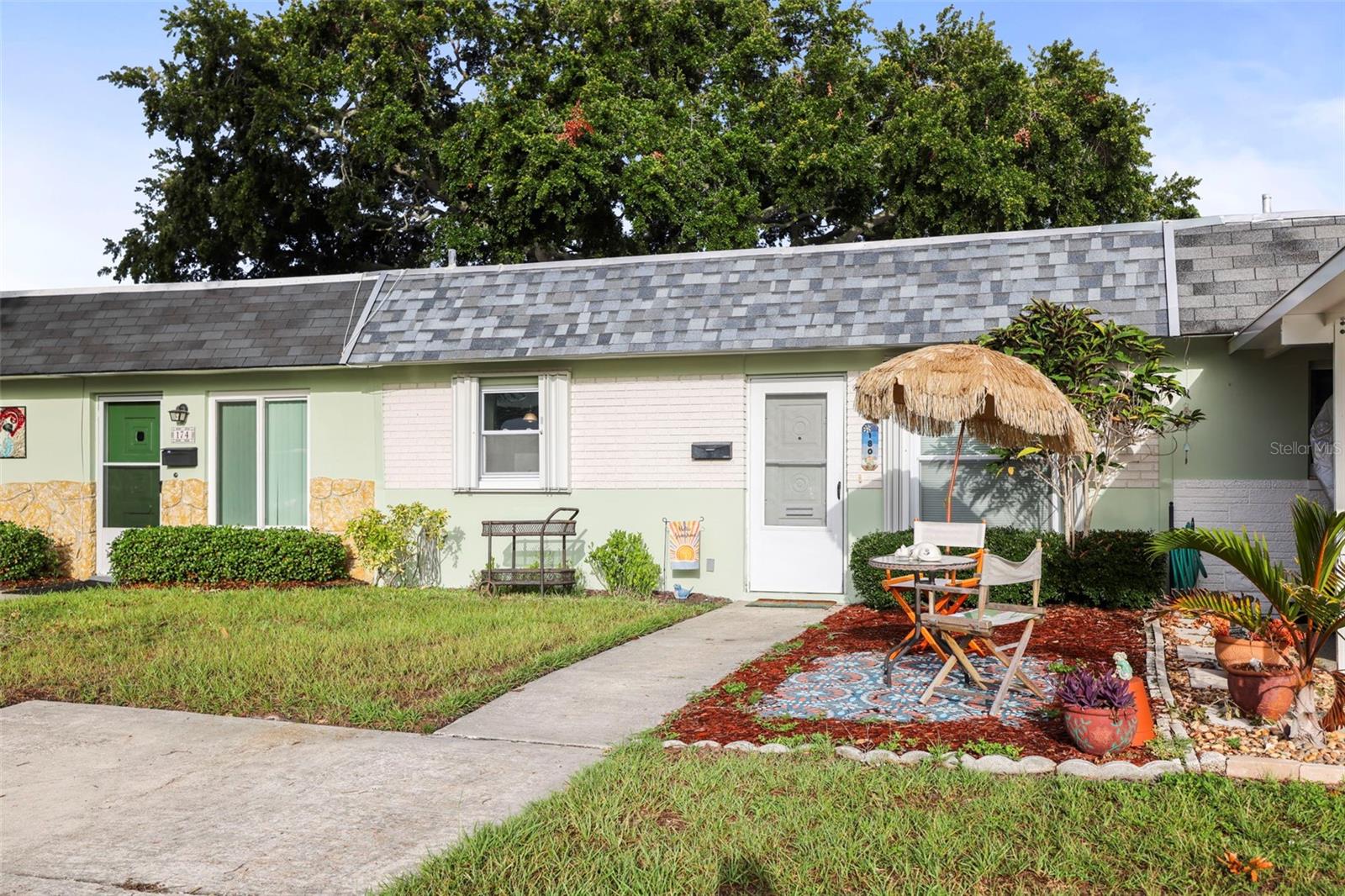 Location, Location, Location !  Skye Loch Villas is one of the best kept secrets in Dunedin. This solid block 950 square foot villa offers 2 bedrooms, 1 bathroom plus an 8’ x 15’ screened porch in the rear. The primary bedroom has a large walk in closet. Comes with a full size washer & dryer plus hurricane shutters. This villa sits on one of the largest lots in Skye Loch. Drive your golf cart to downtown Dunedin, a mile away. Skye Loch Villas is a 55+ community. Clubhouse offers a kitchen and library, community heated pool, shuffleboard, etc. Close to downtown Dunedin, Honeymoon Island, Clearwater Beach, Toronto Blue Jays stadium, The 75 mile long Pinellas Trail, etc. The Historic Fenway Hotel is a mile away, perfect for your out of town guests. Close to the Dunedin Marina, where you can put your kayak into the Gulf of Mexico, with so many islands to discover. Low HOA fees of $320 includes water, sewer, trash, Spectrum internet and Platinum TV cable including Disney+Basic plus Peacock Premium, Spectrum TV® includes access to popular streaming apps at no extra cost, in addition to 150+ channels, lawn care, & exterior paint. With no land lease or flood zone, Skye Loch is a very desirable community. This X flood zone villa had no damage or water intrusion from any past hurricanes or storms, it’s high and dry. Half hour to Tampa International Airport. Golf cart, bicycle or walk to Historic Downtown Dunedin. Come live in Skye Loch villas & enjoy all Dunedin has ~