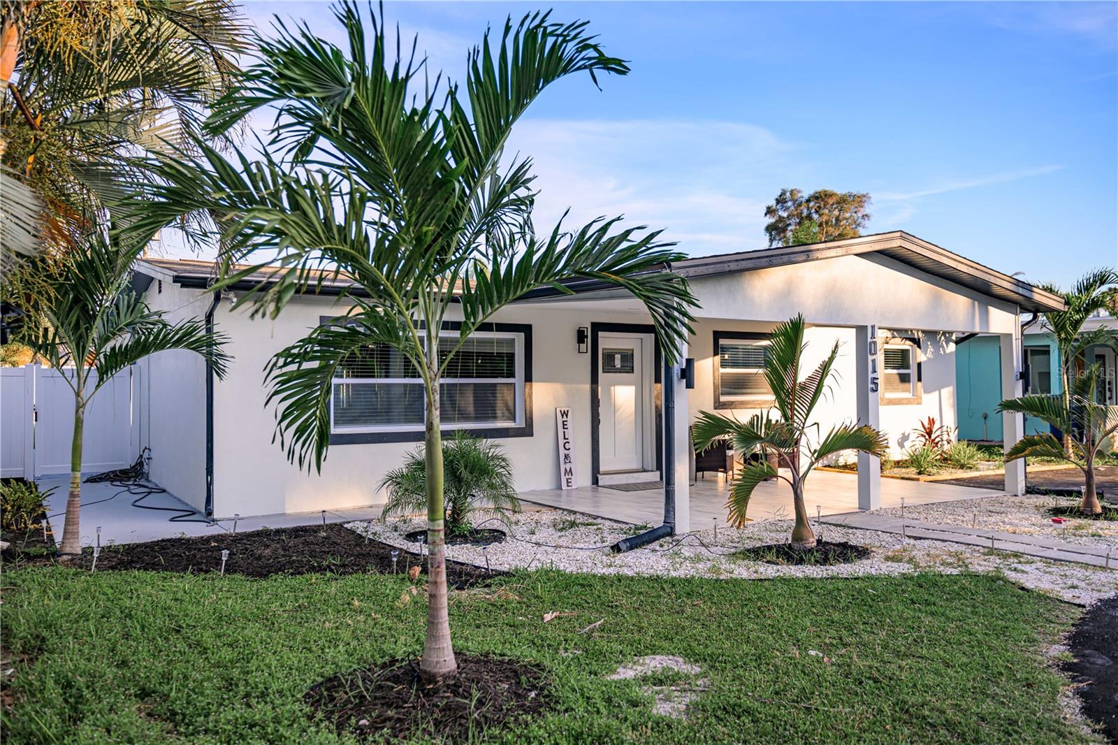 Luxury Coastal Living: Fully Reimagined Island Paradise! Welcome to 1015 Boca Ciega Isle Drive, an exquisite, fully renovated single-family oasis nestled in the highly coveted, serene community of Boca Ciega Isle. Spanning 1,950 square feet with 4 spacious bedrooms and 2 custom bathrooms, this home seamlessly fuses timeless mid-century block construction with meticulous, top-tier contemporary updates. No detail has been spared, and no expense has been shorted in this spectacular turn-key residence. This home is designed with an expensive touch, featuring high-end luxury vinyl plank flooring that runs seamlessly throughout the home. The heart of the property features a gourmet chef's kitchen outfitted with premium, gleaming quartz countertops, solid custom cabinetry, and a sleek layout tailored for entertaining. Both bathrooms have been fully transformed into spa-like sanctuaries, boasting premium tile work, elite fixtures, and immaculate modern finishes. While the cosmetics are stunning, the true value lies in the comprehensive structural and mechanical overhauls. Buy with absolute confidence knowing the heavy lifting is completely finished. This modern coastal residence features a new roof, brand-new hurricane impact windows, a new A/C system, a new water heater, and a new main sewer line for true peace of mind. These brand-new replaced sewer lines represent major infrastructure upgrades rarely found in remodeled homes. Best of all, all renovations have been officially approved, permitted, and signed off by the City of St. Pete Beach. The Boca Ciega Isle Lifestyle: Living here means embracing the best of coastal Florida. You are located just minutes to the nearest boat launch for effortless days on the water, and a short drive or bike ride to St. Pete Beach—consistently named one of America’s top-ranked beaches. The property is surrounded by world-class dining, boutique shopping, and vibrant entertainment, while offering quick access to Downtown St. Petersburg, the Pier, museums, and waterfront parks. This is more than a home—it’s a gateway to a refined coastal lifestyle. Whether you are searching for a permanent luxury residence, a stress-free winter getaway, or a premium addition to your real estate portfolio, this fully permitted masterpiece is a rare find. Schedule your private showing today to experience coastal luxury at its finest!
