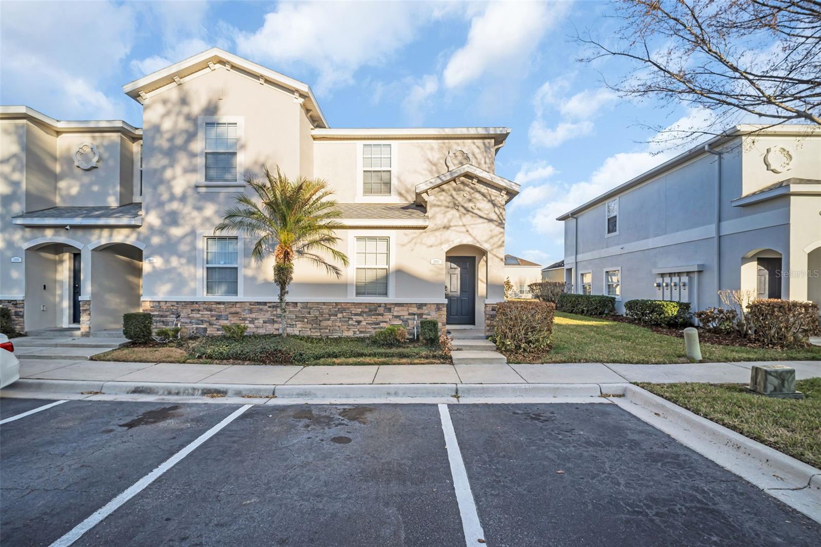 Welcome to 1943 Greenwood Valley Dr, a beautifully maintained end-unit townhome in the gated community of Walden Woods, where low-maintenance living meets peaceful surroundings. This spacious 2-bedroom, 2.5-bath home with a bonus room and loft offers a thoughtfully designed layout that blends comfort and functionality. Enjoy peace-of-mind with a 2025 ROOF! As an end unit, the home is filled with abundant natural light and offers added privacy, creating a bright and inviting atmosphere throughout. The main living area flows seamlessly into the kitchen, creating a comfortable and connected space ideal for both daily living and hosting guests. The kitchen offers abundant cabinetry and expansive counter space, delivering the storage and workspace you need without sacrificing style. Just off the kitchen, the screened-in porch overlooks a peaceful pond, providing a relaxing outdoor setting perfect for morning coffee, casual conversation, or winding down in the evening. On the first floor, you’ll also find a spacious bonus room that can easily serve as a home office, guest space, fitness area, or flex room to suit your needs. A convenient half bath on the main level adds comfort for visitors. Upstairs, the primary suite provides a private escape with an en-suite bathroom and a large walk-in closet. The generous loft space is a standout feature, offering incredible flexibility as a cozy TV room, media lounge, play area, or additional home office. A secondary bedroom with its own walk-in closet, a second full bathroom, and a dedicated laundry room complete the upper level, ensuring both comfort and convenience for daily living. Quarterly HOA fees provide exceptional value, covering water, sewer, trash, exterior maintenance, pest control, grounds maintenance and access to outstanding community amenities. Residents of Walden Woods enjoy a community pool, basketball court, playground, and more — making it easy to relax, stay active, and connect with neighbors just steps from home. With its versatile layout, scenic pond views, and comprehensive HOA coverage, this townhome delivers the perfect balance of comfort, convenience, and maintenance-free living!