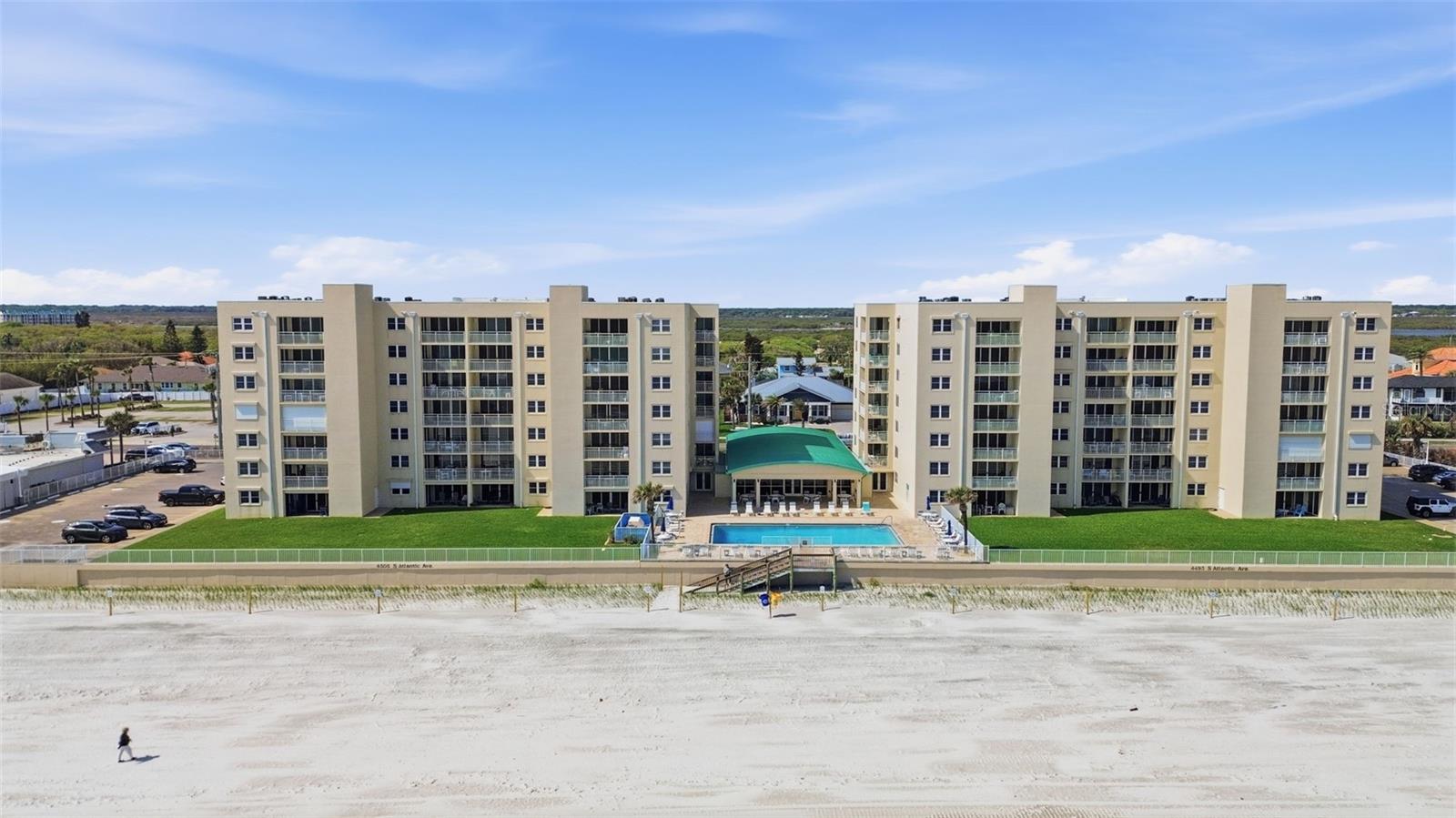 Enjoy coastal living at its finest in this charming 2-bedroom, 2-bath directly on the no-drive pedestrian beach. This inviting unit features durable ceramic tile flooring throughout and a spacious layout designed for comfort and relaxation. Step out onto your private balcony to take in the refreshing sea breeze and stunning shoreline views. The space is being offered fully furnished and is located on the fifth floor of the East Wind North Tower. This move-in-ready condo offers a pool, tennis courts and private beach access which makes the perfect primary home or vacation retreat. A rare opportunity to reside in a slice of paradise right on the beach, just minutes from the Ponce Inlet Lighthouse and local favorites. Condo covered and uncovered parking and an in house washer and dryer. Schedule your showing today!! All info tp be verified by tenant.