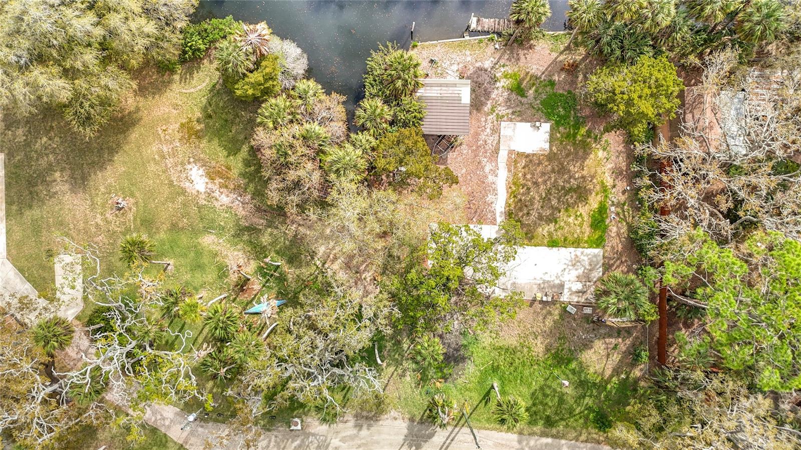 Take a look at this opportunity to live on an Island!! These lots rarely come available, and this one is ready to build on, slab is in place and possible impact fee credits. Manufactured home removed and leaving you with a clean slate to build a beautiful home. Second lot also available just north of this lot. Very near Mary's Fish camp and miles of side creeks and canals to explore. Nearly a direct route to the Gulf for great fishing and boating.  Move out here and forget about the world and enjoy peace and quiet and all the water fun you could dream .
