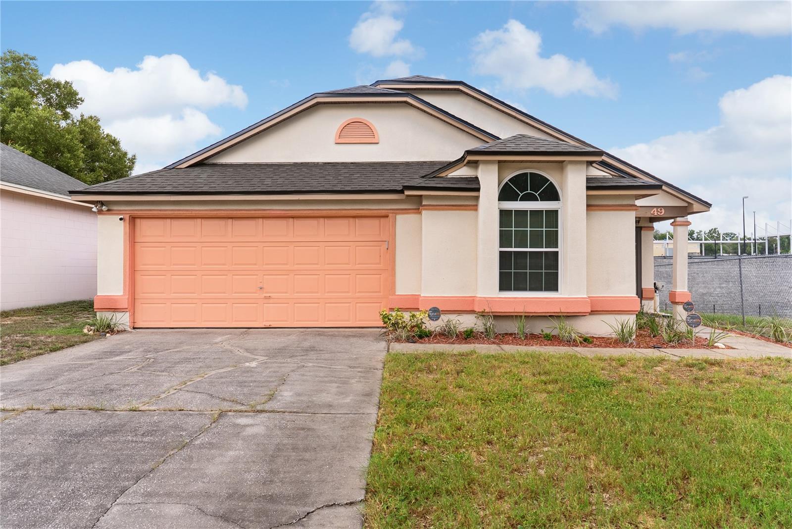 Move-in ready and packed with valuable upgrades, this beautifully maintained 2-bedroom, 2-bath home offers peace of mind with a brand-new roof (2026), A/C (2022), newer windows (2014) with a transferable lifetime warranty, and a paid-off water filtration system. Inside, you'll find new luxury vinyl plank flooring throughout, creating a fresh, modern feel, along with a new stainless steel refrigerator and stove and newer dishwasher. Enjoy your morning coffee or evening relaxation in the newly screened patio overlooking the spacious backyard. Whether you're a first-time homebuyer, downsizing, or looking for an investment opportunity, this home offers the perfect combination of comfort, functionality, and major system updates. Conveniently located near shopping, dining, schools, and major roadways, this is a rare opportunity to own a home where many of the costly updates have already been completed for you. Property is under surveillance.