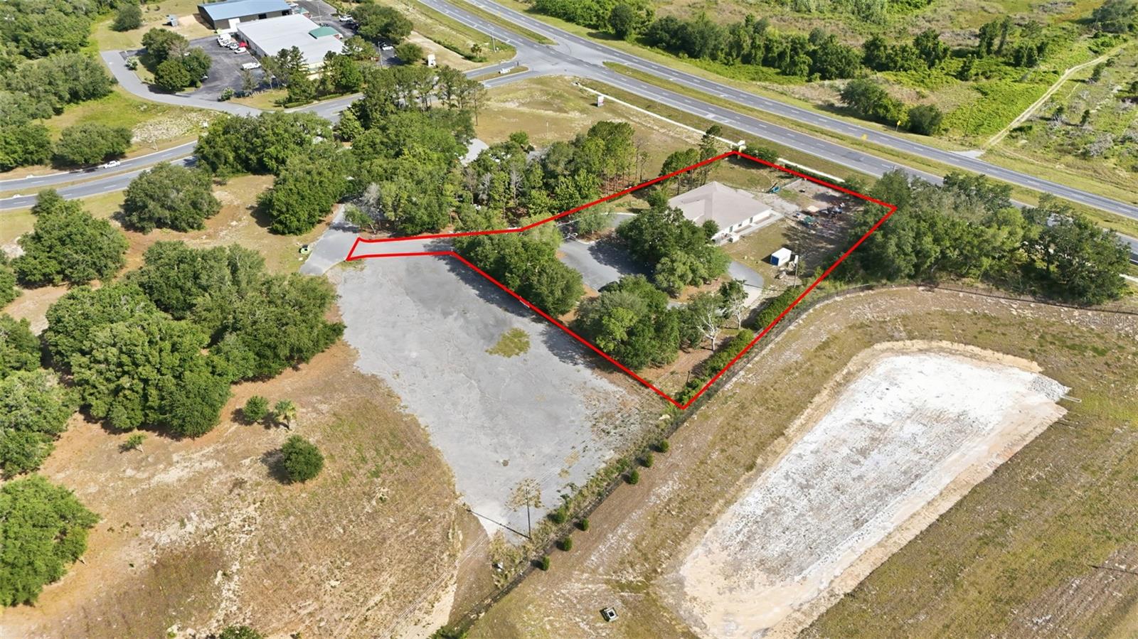 Income-producing commercial property with an established long-term tenant already in place, plus a vacant industrial lot located at the rear of the property. Situated on 3+
acres with valuable frontage along busy Hwy 27 N, this unique offering provides immediate cash flow with outstanding future upside potential.
Endless possibilities for investors, developers, or owner-users, continue collecting income while land banking for future growth, expand the existing use, or utilize the rear
industrial acreage for contractor-based businesses such as HVAC, plumbing, electrical, landscaping, storage, service yards, and more.
Excellent visibility, strong traffic exposure, and flexible potential make this a rare opportunity in a rapidly growing corridor. Public water, well for sprinklers.