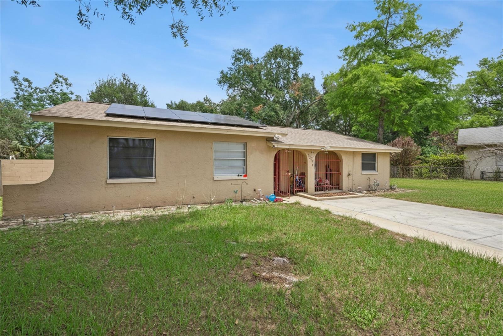 One or more photo(s) has been virtually staged. Is there a 4-bed single family home in Sanford, FL that combines space, convenience, and a quiet cul-de-sac setting? 2209 E Mitch Ct delivers a practical layout, comfortable living areas, and easy access to local shopping, dining, and commuter routes in desirable Seminole County.
Welcome to 2209 E Mitch Ct, a well-located single family home in Sanford offering a functional layout designed for everyday living. This 4-bedroom residence features a spacious living and dining area that flows naturally into the kitchen, creating a comfortable environment for both daily routines and entertaining.
The kitchen provides ample cabinet storage and workspace, while the primary suite offers privacy along with an en-suite bath and closet space. Additional bedrooms provide flexibility for guests, home office use, or multi-generational living. An indoor laundry area adds convenience, and the attached garage offers secure parking and storage.Situated on a quiet cul-de-sac, this home benefits from a peaceful setting while remaining close to everything Sanford has to offer. Enjoy quick access to major highways, shopping centers, dining options, and the charm of historic downtown Sanford and its waterfront attractions.Located within the Seminole County school zone, this property presents a strong opportunity for buyers seeking space, location, and long-term potential.

Schedule your showing today.