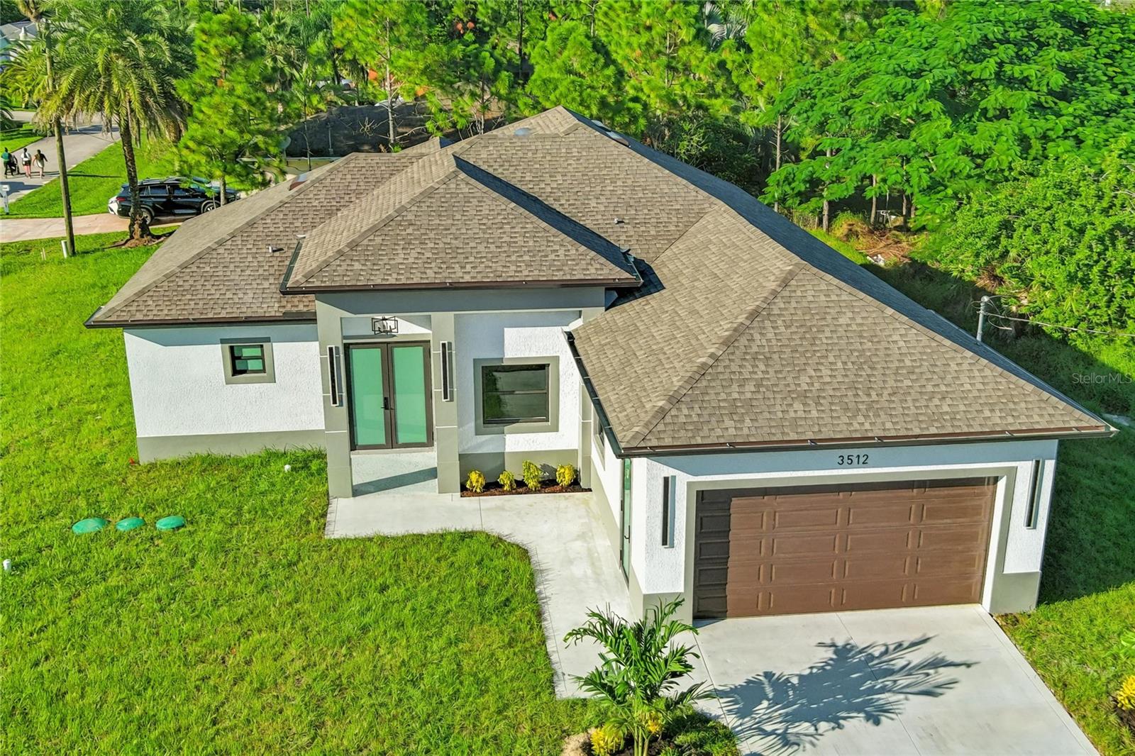Discover this beautifully designed 5-bedroom, 4-bathroom corner home featuring 2,218 sq. ft. of living space and impressive high ceilings that fill the home with natural light and a sense of openness. The spacious layout offers comfort and flexibility for modern living, while the bonus room provides an excellent opportunity for a home office, guest suite, or even an income-producing space. Each bedroom is generously sized, and the bathrooms are tastefully updated with modern finishes. Situated on a desirable corner lot, this property offers added privacy, curb appeal, and extra outdoor space. Perfect for families or investors, this home blends functionality, elegance, and potential in one exceptional package. Don’t miss out on this rare find! 26-44-26-13-00013.0230