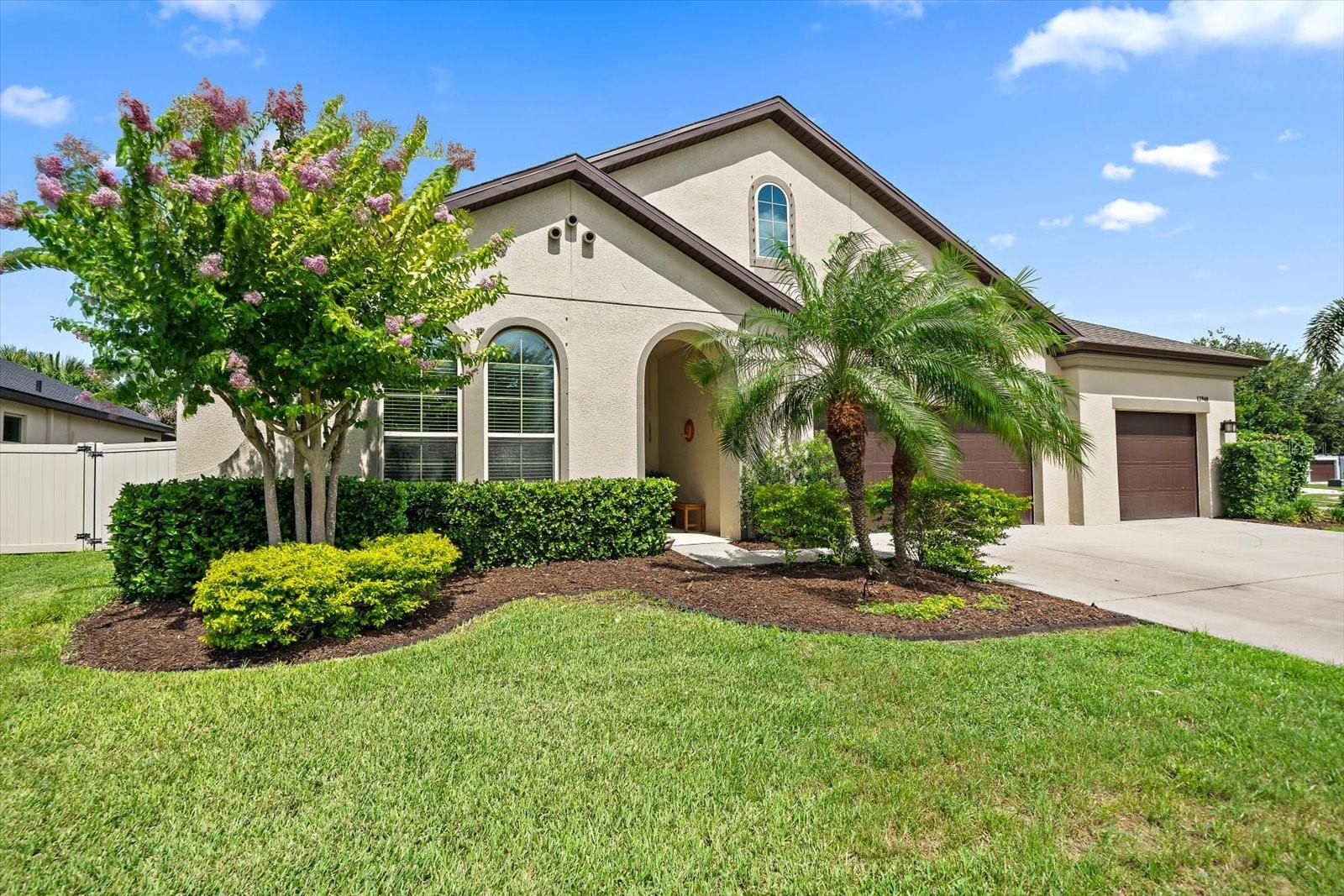 Here is a home you’ll want to see right away! Exceptionally maintained and thoughtfully upgraded, this stunning 5-bedroom, 5-bathroom, 3-car garage residence in the gated community of Serenity Creek offers the privacy and space you have been looking for. From the moment you arrive, the home impresses with its striking curb appeal, lush low-maintenance landscaping, and wide driveway. Inside, the easy-flowing floor plan provides flexible living and entertainment options. Elegant tray ceilings grace the hallways and living areas. In the front of the house you will find one of the guest bedrooms and a versatile office/ currently used as a gym as well the dining area. The gourmet kitchen features granite countertops, double ovens, a large island, elegant cabinetry, an upgraded butler pantry, and a walk-in pantry. The breakfast nook opens seamlessly to the inviting living room, creating a bright and welcoming heart of the home. The luxurious primary suite is a private retreat with an oversized walk-in closet, spa-inspired soaking tub, and large shower. Throughout the home, you’ll appreciate the numerous high-end upgrades and thoughtful details, Roof 2022/gutters 2024, 2 HVAC, UV light systems, 2 water  heaters 2025/26. Up the beautiful wooden staircase with wrought iron banisters, the second level features a spacious loft, ideal as a theater room, playroom, or secondary living area, plus a 5th bedroom with its own bathroom, perfect for teenagers or guests. Step outside to your backyard paradise: a relaxing saltwater heated pool and spa surrounded by lush scenery and abundant wildlife. What truly sets this property apart is the large, fully fenced side yard, big enough for whatever you imagine: lively pool parties, dog park, or even your own tennis court. Serenity Creek is a beautifully maintained, low fee, CDD free gated community in a prime location near Lakewood Ranch. Enjoy A rated schools, parks, trails, and easy access to I-75, with Tampa, Sarasota, and world class beaches just minutes away.