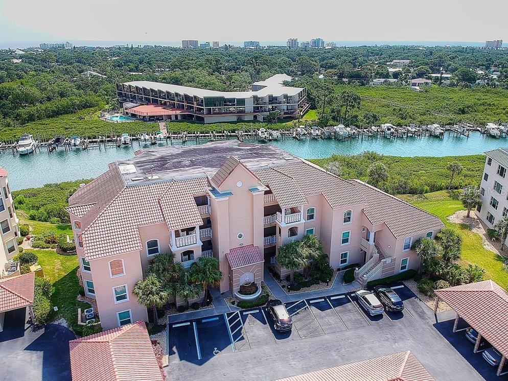 ***$30,000 PRICE REDUCTION***BOUCHELLE ISLAND PENTHOUSE***THERE ARE ONLY SIX OF THESE UNIQUE UNITS ON BOUCHELLE ISLAND. THIS 3 BEDROOM, 3 BATH UNIT WITH VAULTED CEILINGS AND 2 MASTER SUITES IS LOCATED IN ONE OF THE SOUGHT AFTER BLOCK CONSTRUCTED ***POINTE BUILDINGS***AND IS ONE OF ONLY TWO UNITS ON THE 4 TH FLOOR. WITH A 20X8 FOOT ENCLOSED LANAI  CONNECTED TO ONE SUITE AND AN OPEN BALCONY TO THE OTHER YOU CAN ENJOY THE WILDLIFE, KAYAKERS, DOLPHIN ROLLING AND VIEWS OF THE NORTH BRIDGE AND INTRACOASTAL FROM YOUR LANAI OR BALCONY OVERLOOKING CALLALISA CREEK. COMPLETE WITH PLANTATION SHUTTERS AND STORM SHUTTERS THRU-OUT AND NEW HOT WATER HEATER AND A/C AS WELL AS PLENTY OF STORAGE BOTH OUTSIDE YOUR UNIT AND IN FRONT OF YOUR ASSIGNED CARPORT. ***DON’T MISS THIS ONE.*** ;LocationDescription: Condo ;Water: City