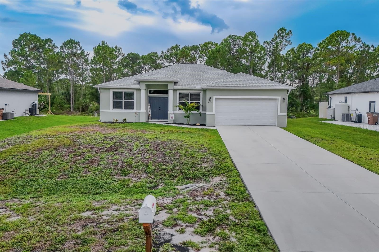 Absolutely gorgeous well appointed, newer home with 3 bedrooms plus a den and a formal dining room. Home was built in 2020 and has been meticulously maintained by the owners. Lovely kitchen with white shaker cabinets, granite countertops with eat-on countertops and Whirlpool stainless steel appliances that all stay. The refrigerator is approximately 6 months old, new dishwasher being installed. The owner's suite has a walk-in closet and the owner's bathroom has dual sinks with granite countertops, a soaker tub and a separate walk-in shower with gorgeous tile surround. Family room with vaulted ceilings and sliders that lead to the private backyard looking out to a wooded area. Washer and dryer are also included. All windows including the transom are impact resistant. Ceiling fans throughout. Freshly painted inside and out. Located a few blocks from Route 82 which allows easy access to shopping, the airport and stadiums.