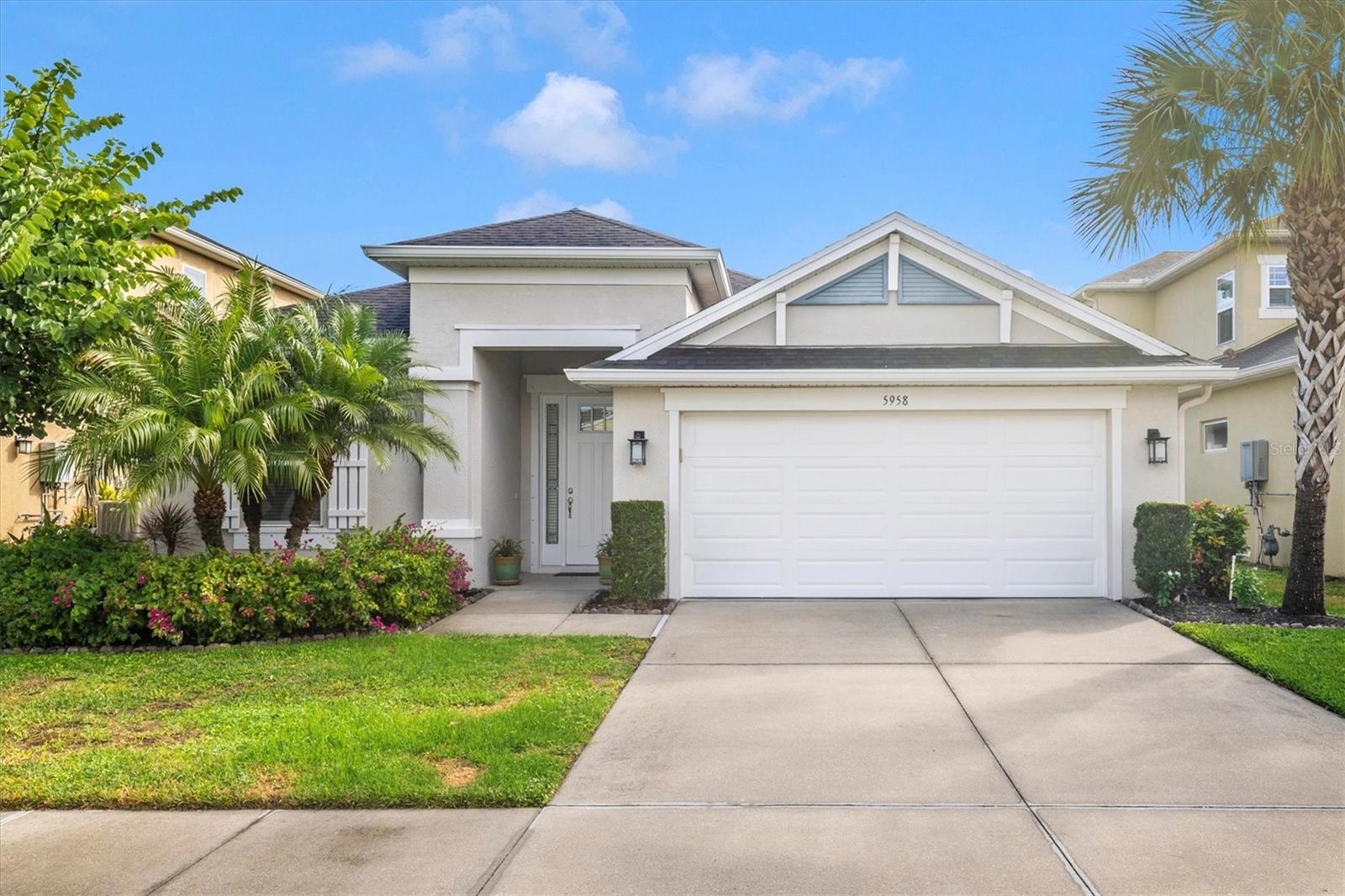 Meticulous home on Best Location on Lake with fully fenced back yard and sweeping views of the lake and the native water birds.  The three-panel sliding glass doors open completely to the tiled Lanai.  The Rotunda of the home offers something special in the home and is a great place for holiday tree decorating. Home Connect wi-fi. Easy-to-clean upgraded porcelain tile floor throughout the house.  Enjoy all of the kitchen granite counter space with seating room for 4. BOSCH dishwasher is UNHEARD when running and cleans dishes completely.. High ceiling architectural designs give a pleasant open-air feeling throughout the house. Updated LED light fixtures and ceiling fans. Accent colors walls and subtly on ceilings create a dynamic, luxurious space. Gas tankless hot water heater for low utility bills (gas connection is available to support a gas range.) Primary Bedroom with tray ceiling and en-suite Bath walk-in shower, two walk-in closets. The location within Palmer Ranch makes for great accessibility to shopping, medical facilities, restaurants, and the #1 voted Best Beach in USA!
