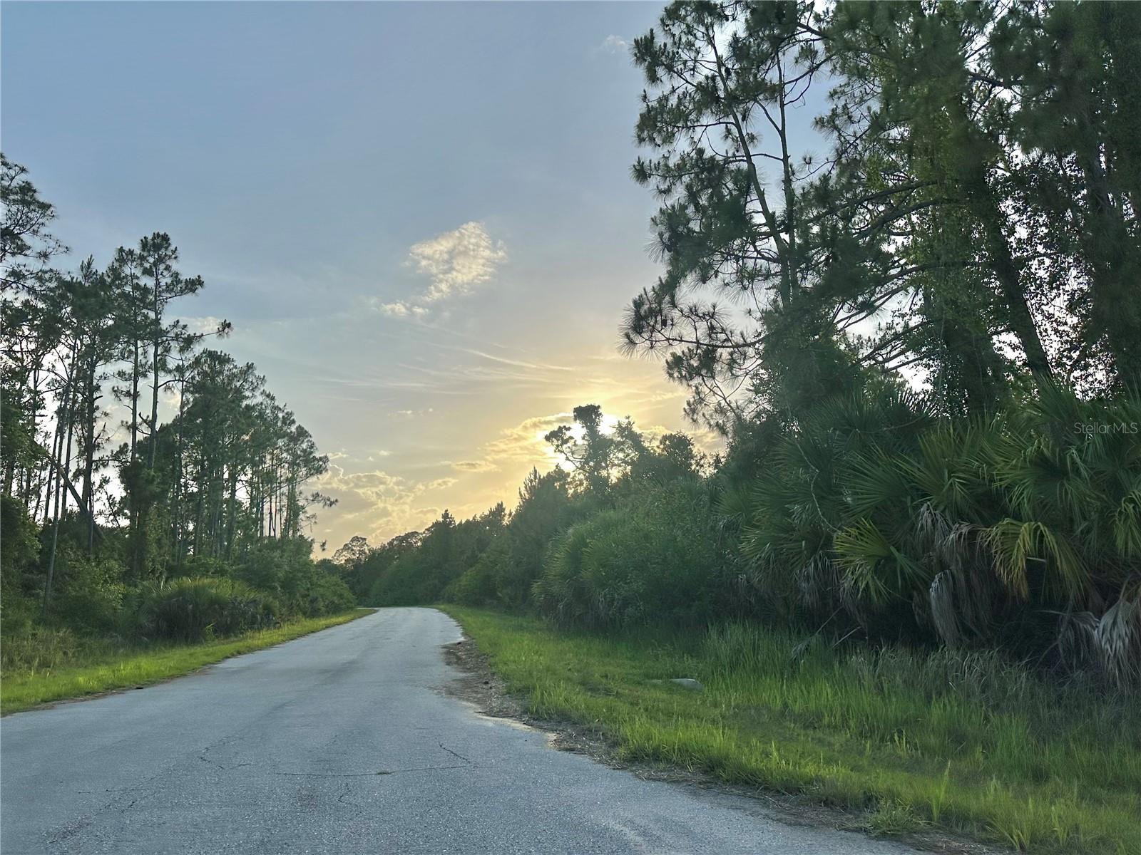 Discover the possibilities in the growing rural area of Southeast North Port with this oversized homesite offering 12,412 square feet. This unique corner-style parcel has its tip fronting on Barcelona Drive, with much of the frontage along Belgrave Terrace, creating an attractive setting for your future Florida home. Even better, the adjoining Lot 12 on Belgrave Terrace is also available separately, MLS C7526585, adding another 13,448 square feet and creating over one-half acre when purchased together.

This area still offers a peaceful, natural Florida setting, yet new homes are being built nearby and the location remains convenient to Port Charlotte, Veterans Boulevard, Kings Highway, and Interstate 75. A short drive brings you to the playground and splash park near Atwater Elementary, while the greater Southwest Florida lifestyle offers Gulf beaches, boating, fishing, golf, parks, nature trails, shopping, dining, and both Atlanta Braves and Tampa Bay Rays Spring Training venues.

An exciting long-term growth factor for this area is the proposed future Interstate 75 interchange near Yorkshire Street and Raintree Boulevard, which has been discussed as part of regional planning to improve hurricane evacuation routes and future traffic flow.