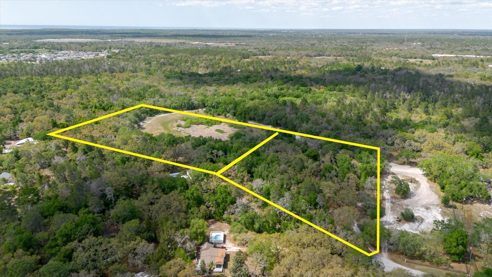 Come check out this 8.93 acre mini farm land located close to everything in Hudson, Florida. 3.93 acres of Residential/ Agricultural land that backs up to 5 more acres with a seasonal pond! The property has a ton of potential and room for cattle, livestock and a dream mini farm space with beautiful trees and scenic views!  Perfect spacious land for a custom build home! Conveniently located near US-19, shopping, dining, and Gulf Coast beaches, no HOAs, off of a Pavel cul-de sac off Kitten Trail Road. 
You don't want to miss this! Showing Agent needs to be there for ANY showings!