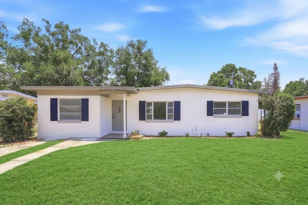 Virtually Staged. Welcome home to one of the best values in Mount Dora! This beautifully updated 4-bedroom, 2-bath home is currently the lowest-priced 4-bedroom single-family residence available in Mount Dora, offering an incredible opportunity for first-time buyers, growing families, or anyone seeking maximum value. Recent improvements include a new roof, upgraded electrical, updated flooring, fresh interior paint, and stylishly renovated kitchen and bathrooms. The efficient floor plan provides the space your family needs without the burden of excess square footage and maintenance. Enjoy modern, clean finishes throughout and a large backyard perfect for entertaining, pets, gardening, or creating your own outdoor retreat. Conveniently located just minutes from the charm of Mount Dora, you'll have easy access to the city's renowned festivals, waterfront parks, boutique shopping, award-winning restaurants, farmers markets, and year-round community events that make Mount Dora one of Central Florida's most desirable places to live. If you've been searching for an affordable 4-bedroom home with major updates already completed, this property deserves a spot at the top of your list.