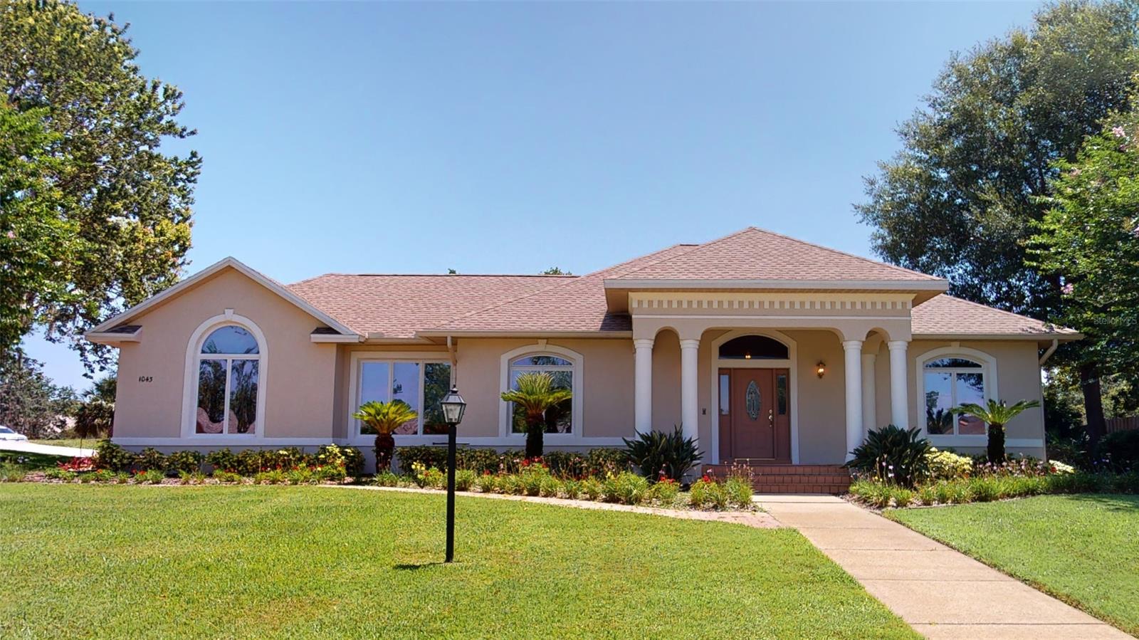 Lovingly maintained home on a corner lot in prestigious Sugar Mill Country Club.  3 bedroom, 2 bathroom, 2 car garage block home with split plan.  Mature landscaping invites you in.  At the heart of the home is the living room featuring tile flooring, vaulted ceiling and French doors leading to the screened lanai and then pavered rear patio.  Spacious kitchen offers plenty of storage, pullout shelving, white cabinetry, crown molding, gas cooktop, breakfast bar and window to the screened lanai.  Kitchen is open to the dining area and office.  Master bedroom with huge walk in closet, master bathroom with tile walk in shower.  All bedrooms have carpet flooring.  Side entry oversized 2 car garage features a workshop/utility room.  Large pavered patio in rear is very private.  Add'l features:  Central Vacuum, New Roof 2017, Massey termite protection, Gas water heater 2018, A/C 2013. Home is being offered furnished including some small appliances. Sugar Mill Country Club is a private club and offers 27 holes of  golf, tennis & pickleball, 3 restaurants, work out facility and pool by separate membership.  Several membership options, inquire within. ;Water: City
