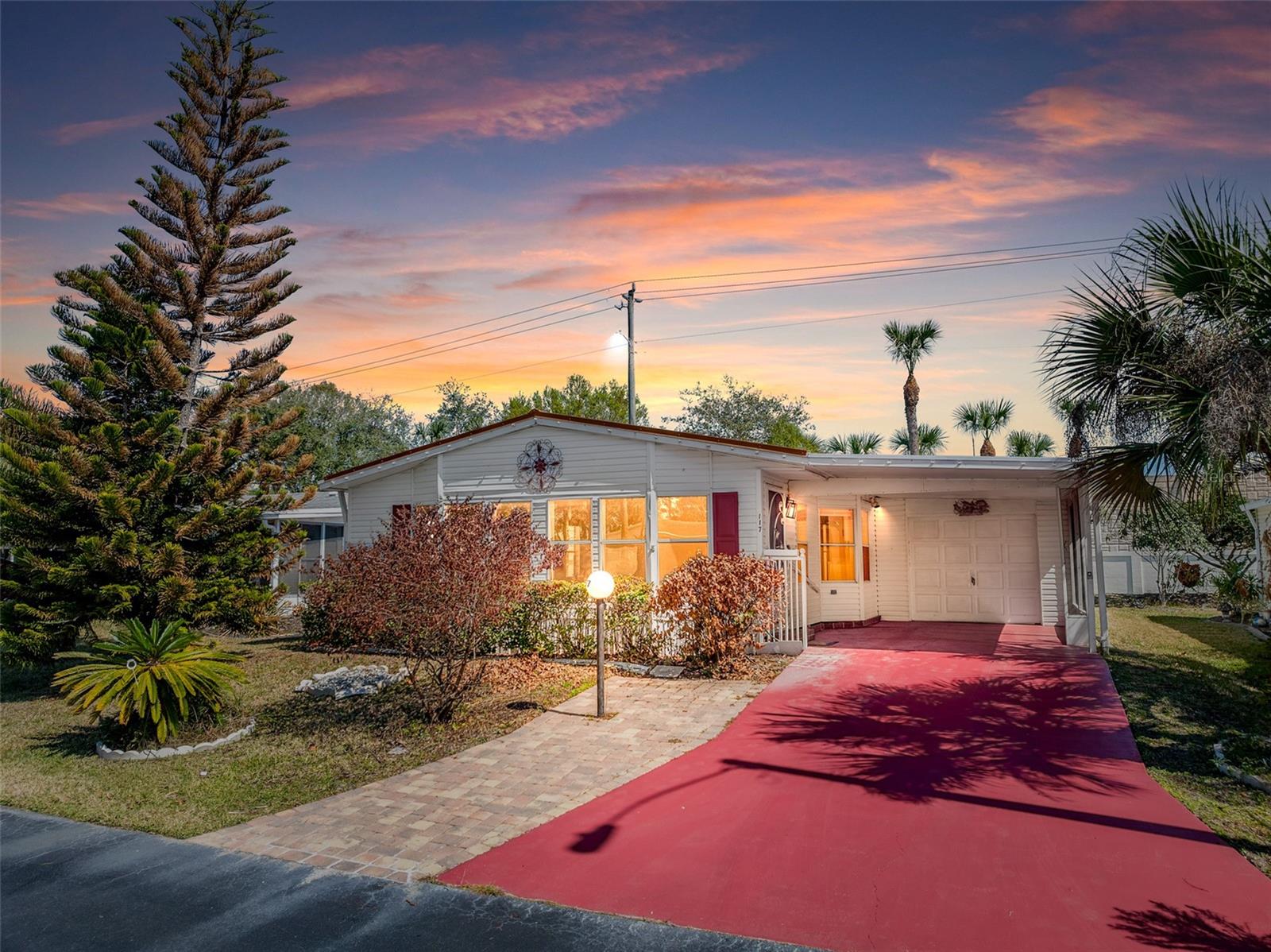 BACK ON MARKET, BUYERS FINANCING FELL THROUGH! $1500 CREDIT TO BUYER AT CLOSING if closed within 30 days of contract date!
Welcome to easy Florida living in this desirable gated senior community where low HOA fees include cable, internet, lawn care, irrigation, and security, providing true maintenance-friendly living and peace of mind. Recently refreshed and move-in ready, this spacious 2-bedroom, 2-bath home offers 1,393 square feet of bright and inviting living space. A huge living room filled with an abundance of windows allows natural light to pour in, creating a warm and welcoming atmosphere. The open-concept layout flows seamlessly into the dining area and large kitchen, which offers ample space to add an island -- perfect for entertaining or everyday comfort. Enjoy both front and back patios ideal for morning coffee or relaxing evenings outdoors, along with plenty of parking for vehicles and recreational toys including a golf cart, kayak, and more. Important updates include a new roof installed in 2024, water heater replaced in 2018, and AC system installed in 2004. Life in Lost Lakes offers an

active and vibrant lifestyle centered around a beautifully appointed clubhouse featuring a dining room, fully equipped kitchen, library, fitness room, billiards, and card room. Just outside, residents enjoy a sparkling pool and spa along with tennis, pickleball, and shuffleboard courts. Community pride shines throughout thanks to residents and volunteers who help maintain the beauty and cleanliness of this welcoming neighborhood. As an added bonus, enjoy watching breathtaking rocket launches right from your own yard.

Low-maintenance living, land ownership, and resort-style amenities come together to create exceptional value -- schedule your private showing today because this one won't last!