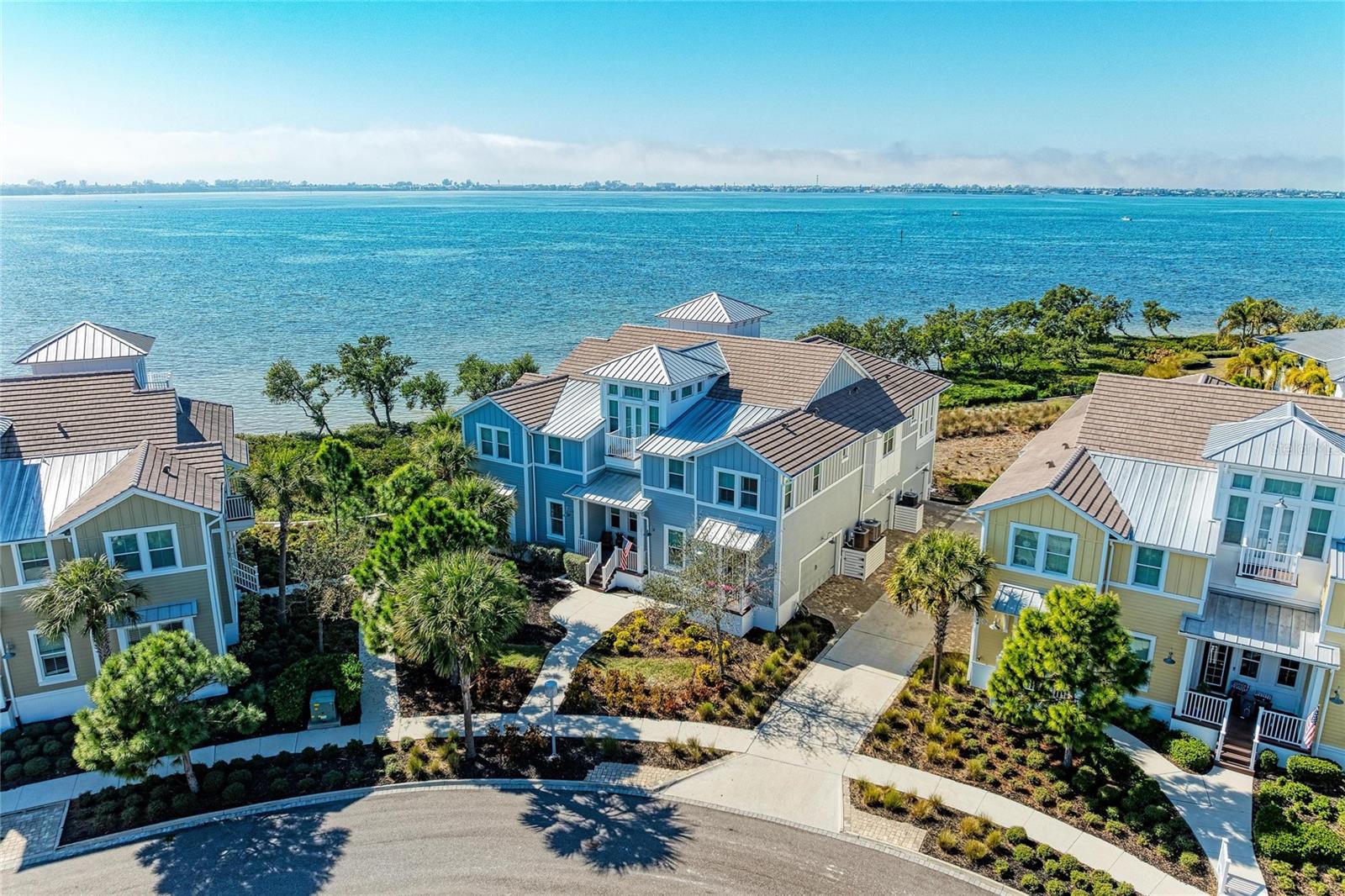 THIS IS THE ONE YOU HAVE BEEN WAITING FOR! THE CREME DE LA CREME!
Look no further for your fabulous waterfront home—with perfect, unparalleled
unobstructed views of Anna Maria Sound and spectacular sunsets from every room -
the ultimate waterfront vantage point and the only home in the development where all
the rooms have various water views. You cannot compare this home with any other
home of similar design in the Harbour Isle Development. Most of the rooms are
positioned with close water views of Anna Maria Sound, giving you the feeling like being
on a boat. This unrivaled coastal luxury home is located in the prestigious, beautiful,
gated community of Harbour Isle. The entrance porch to the home is positioned so it is
totally private, along with the fabulous water views. No other home in all of Harbour Isle
has this type of privacy along with the associated water views. Enjoy sweeping views of
the Sound, Anna Maria Island, Tampa Bay, Egmont Key and out into the Gulf. This
highly sought after spacious, ground level, four bedroom and three bath Abaco style
home is a true masterpiece of light, water and sophisticated design, and is located in a
highly desired area of the community—just two homes away from the spectacular
23,000 square foot Beach Club where you can walk over and raise a glass at the
SkyBar lounge and then continue with the heated resort pool, spa, private beach to
launch kayaks into the Sound and 4,200 square foot fitness center. There are a
multitude of upgrades in the interior of this luxury coastal home. To name a few - wood
look plank tile flooring through most of the home, crown molding, Plantation shutters, a
gourmet kitchen featuring Quartz countertops, all wood soft close cabinets with rollout
drawers, high-end stainless steel appliances, GE front control Double oven, LG
microwave. In Owners’ Retreat are custom window treatments, Blackout blinds, an
ensuite bathroom with dual Quartz vanities and frameless glass shower, custom closets
with lockable jewelry drawers. There are artistic wall finishes, seascape mural in the
sunroom that extends the natural open- water horizon, faux finish painting in the
common bathroom and many more high-end features! One of the four bedrooms has a
beautiful built-in desk and wall cabinets. This desk window overlooks the water. Peace
of mind comes standard with full hurricane impact windows and doors, solid core doors,
block construction with Hardie Plank siding, built to LEED-Certified energy efficient
standards for ultimate strength and efficiency. The oversized two-car garage provides
extra depth for larger vehicles and maximum storage with 2 storage cabinets staying.
Harbour Isle is second to none. Inside the gates explore two miles of walking trails.
There are four community pools for your enjoyment featuring cabanas and grills, a
splash pad and playground. Truly an active lifestyle! The Safe Harbor Marina with
wet/dry slips, Margaritaville inspired Compass Hotel and Floridays Restaurant outside
the gates. This gorgeous home is about a mile from the sugar sand beaches and quaint
island charm of Anna Maria Island and the famous Robinson Preserve with miles of
walking, biking and kayaking. If you are looking for perfection in a waterfront home this
is it! The crown jewel and the most coveted position in Harbour Isle. Call and schedule
your private showing. Truly Paradise and it can all be yours.