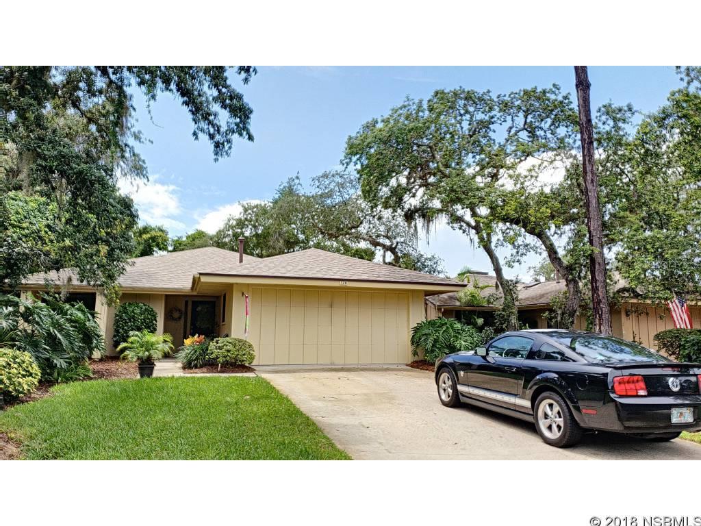Impeccable golf villa on #5 Red fairway, gorgeous quiet views. Private back yard and patio. Spacious LR/DR area with FP for entertaining, w/attached separate den w/wet bar & pass thru to kitchen. The best entertaining arrangement. Beautifully remodeled kitchen with gorgeous granite, new SS appliances 2016, new ceiling lights. Reading nook overlooking private patio.  2/2 split plan provides privacy. Lots of storage. Master suite with private screen porch, separate tub and shower & its own HVAC.  Other upgrades include new carpet 2017, new roof with new skylights 2016, new front and kitchen-garage doors. Transferable termite bond. This home had new exterior paint in August 2018. Enjoy the good life while your yard is taken care of for you. Donât miss this special home. ;Water: City