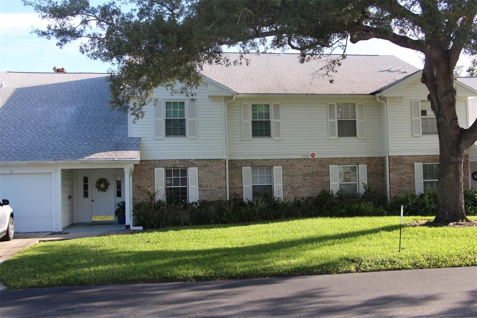 Welcome to this beautifully maintained first-floor condo offering comfort, convenience, and low-maintenance living in a desirable community. This light-filled residence features a spacious open layout with a seamless flow between the living and dining areas—perfect for both everyday living and entertaining. The well-appointed kitchen offers slate-finish matching GE appliances with ample cabinetry and a functional design that makes meal preparation a pleasure. The primary suite provides a peaceful retreat with a walk-in closet and a private bathroom, while the additional bedroom and recently remodeled bathroom offer flexibility for guests or a home office.
Step outside to enjoy relaxing mornings or quiet evenings on your enclosed, private patio. A standout modern feature of this property is that it comes pre-wired for electric vehicle charging, adding exceptional future-proof value. Additional highlights include an in-unit laundry room, assigned parking, and a one-stall garage. Residents of Dover Village enjoy a welcoming atmosphere along with community amenities such as a pool, tennis courts, clubhouse, and beautifully maintained grounds. Conveniently located near FL 408, you will have easy access to shopping, downtown Orlando, and Orlando International Airport (MCO). Whether you are a first-time buyer, downsizing, or seeking a seasonal retreat, this move-in-ready condo is an exceptional opportunity to enjoy easy Florida living.