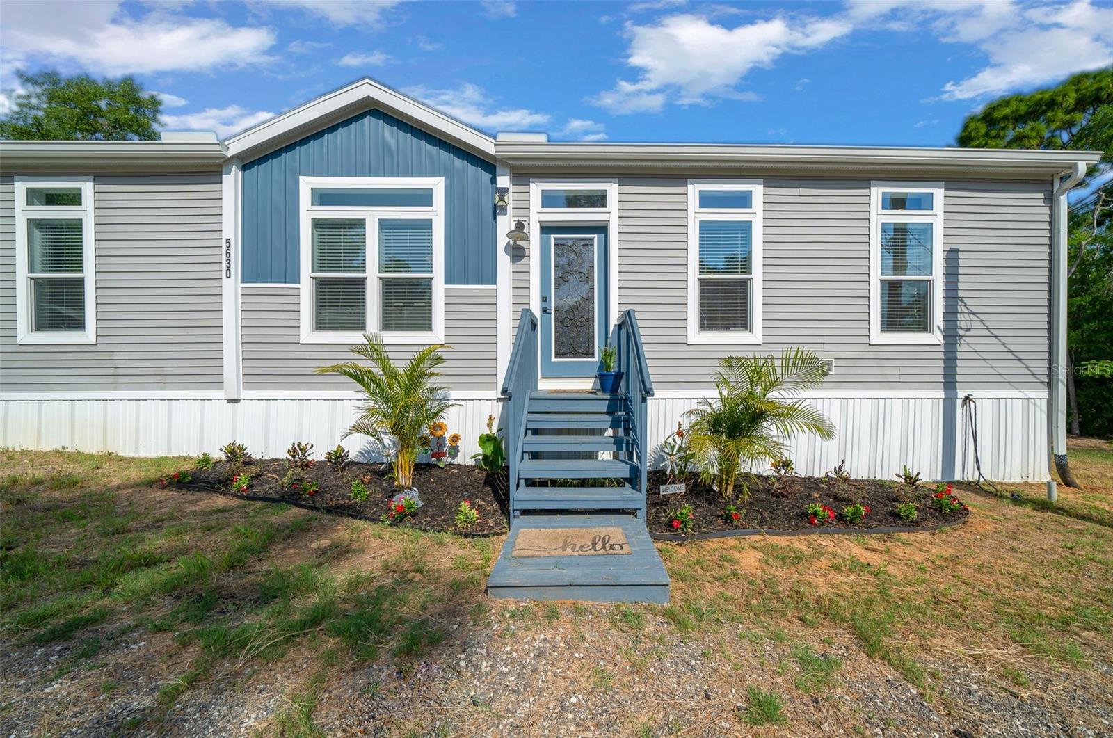MOTIVATED SELLER!!! When I say beautiful…I mean a BEAUTIFUL 3 Bedroom, 2 Bath Manufactured Home on 1.79 Acres that you don’t want to miss scrolling through the pictures on! 

Welcome to your dream retreat! Nestled on a secluded lot, this stunning 3 bedroom, 2 bath manufactured home boasts 1,800 sq. ft. of beautifully designed living space. Perfect for families or those seeking tranquility, this 2022 Palm Harbor home combines comfort and style.

Key Features:
- Spacious Living Areas: Enjoy two comfortable living rooms, a dedicated dining room, and an office space, providing ample room for relaxation and productivity.
- Modern Kitchen: Featuring stainless steel appliances, modern fixtures, and a charming farmhouse-style sink—ideal for cooking and entertaining.
- Private Lot: Set on 1.79 acres, this property offers privacy and space for outdoor activities, with about an acre uncleared for your enjoyment or future development.
- Outdoor Living: Step out onto the 20 x 20 paver outdoor deck, installed just a year ago, perfect for gatherings or peaceful mornings.
- Above Ground Pool: Dive into fun with the above-ground pool that conveys with the property!
- Additional Storage: Two sheds with electricity provide excellent storage options, allowing you to keep your yard clutter-free.
- Laundry and Mudroom: Convenient inside laundry and mudroom enhance functionality.
- Secluded and Peaceful: Enjoy the serenity of a well-constructed home with a transferable 10-year warranty, ensuring peace of mind.
- Upgraded Systems: Includes an upgraded water softener system for improved water quality.

Potential for Furniture Conveyance: Some of the furniture may also be included, making it easier for you to move right in!

This property is perfect for those looking for a peaceful retreat while still having convenient access to local amenities. Don’t miss out on this unique opportunity to own a beautiful home surrounded by nature in a tranquil setting. Schedule your private tour today!