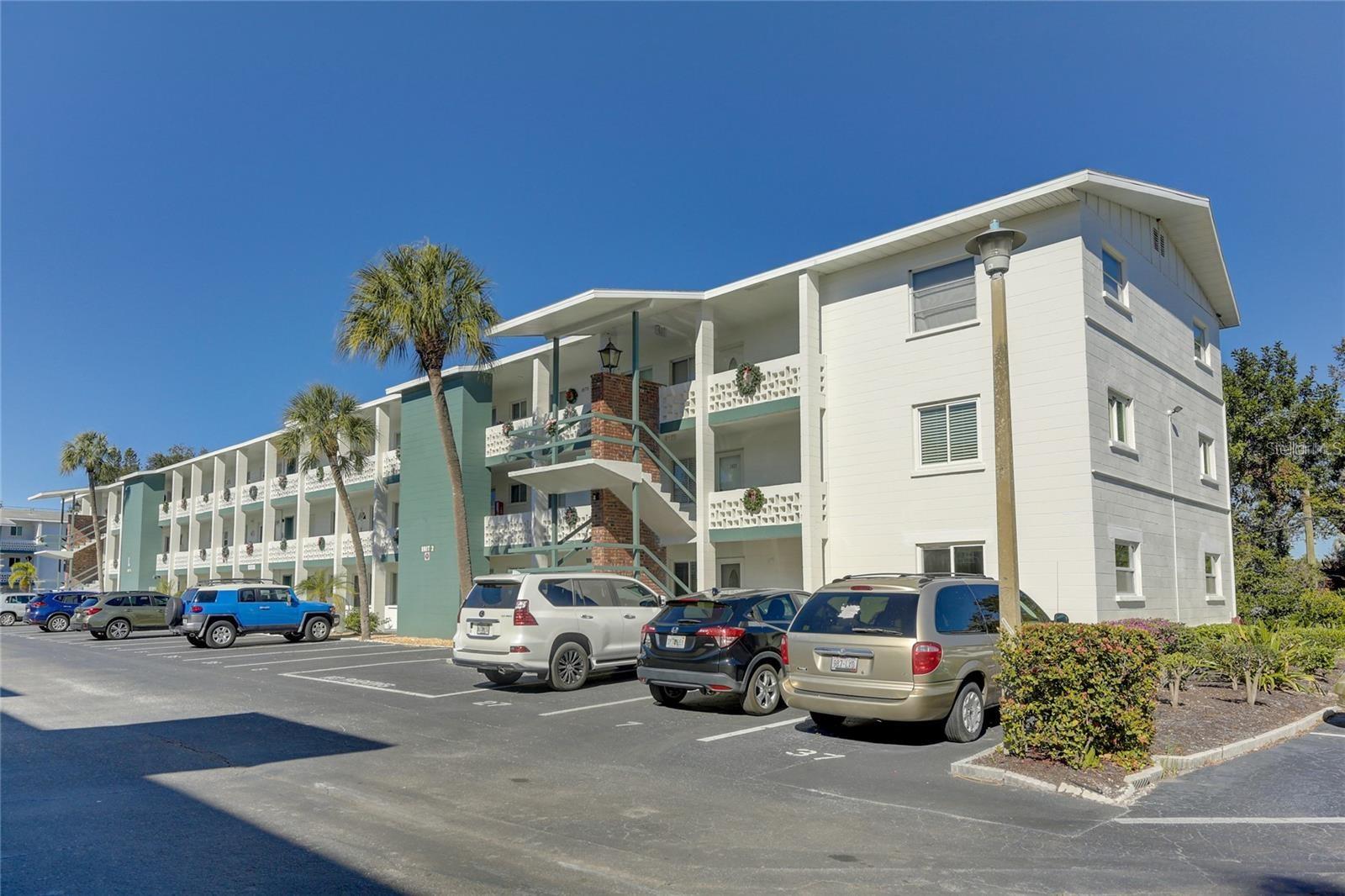 Welcome to Bayshore Condominiums! This 2 bedroom 2 bath, 1,026 sf unit with a $334 Hoa fee is located on the first floor & is a beautifully renovated larger end unit in a 55+ community. Inside you will realize no expense has been spared over the years from not only the cosmetic updates but the costly mechanical expenses as well. The air conditioning unit was replaced in 2016, the hot water heater and upgraded electrical panel with new electrical box and 200 amp service was added in 2019, and the majority of the condo has new impact glass windows. This unit also provides the convenience of its own full size washer and dryer which was added in 2020. The beautiful kitchen features white cabinetry, granite countertops, barstool seating, newer appliances, and even a closet pantry providing plenty of storage space. Laminate flooring flows throughout the entire home allowing easy upkeep. Both bathrooms have also been completely renovated from the flooring with ceramic tile to the sink, vanity, and fixtures. This home comes with a beautiful heated & cooled sun room allowing you to relax and truly enjoy the garden landscape. The majority of the furniture can be included with sale or removed. With low association fees at $334 monthly, Second Bayshore Condominiums provides a beautiful heated community pool, shuffleboard, and a very active clubhouse that plans several events throughout the year. The world renowned gulf beaches of Siesta Key, Bradenton & Anna Maria Island are minutes away. Both Downtown Sarasota and Bradenton are nearby where you can attend the Farmers Market’s, Art Show's or spend the afternoon at a museum or theater. Welcome to Paradise!