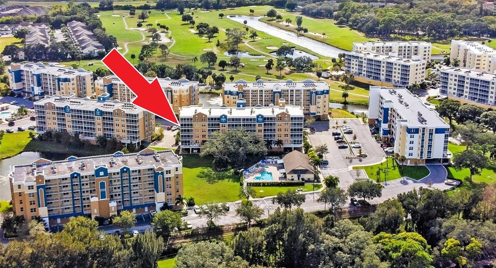 ONE-OF-A-KIND condo in all of Pinellas County! Fully Funded and SIRS compliant with a low monthly fee and no pending special assessments. This is an exceptional corner unit offering the LARGEST FLOOR PLAN, premium upgrades, and 2 GARAGES + 1 COVERED SPACE. BLDG 5 at Golf Lake Condos is renowned for its superior post-tension cable construction and maintenance. Inside, the gourmet kitchen is a showpiece with hardwood cabinetry, kitchen island (outlets and storage) hallway pantry plus cabinet pantry with pull-outs, dual sink with lowered divider and sprayer faucet, and LG matte black appliances: Smart Grid refrigerator with filtered ice/water, and ThinQ dishwasher. The open dining and living areas allow space for full-sized tables and couches. The primary suite is designed for luxurious functionality: dual closets and vanities, wood cabinetry, beveled-edge mirrors and cabinets, and a private water closet. The original small shower was redesigned into the linen closet making way for a stunning, spa-like retreat with frameless glass walk-in shower, built-in bench, laminated marble slabs (no grout), dual shower heads, and linear drain. Both bathrooms feature coordinated fixtures and grab bars from the Moen Eva Collection. The additional bedrooms are positioned at the front of the condo. The third bedroom, enclosed by French doors, is an ideal office with natural light. Guest bath features a BB-2000 bidet toilet with customizable settings. Other Upgrades: 80-ounce plush carpet • Bifold doors replaced with standard doors • Brushed nickel door hardware, plus Decora rocker light switches and receptacles throughout. This condo offers ABUNDANT STORAGE SOLUTIONS (inside, not in a humid exterior closet). The A/C closet in the front hallway (away from the bedrooms), houses a quiet variable-speed air handler. The utility closet is designed for max functionality: Ergonomic height Maytag 5000 Series washer & dryer with storage drawers • 50-gallon water heater and WATER SOFTENER • Cabinetry, wash sink, mudroom essential storage • Additional space for a mini freezer. The rear Northern facing patio is designed for year-round enjoyment with sliding windows, ceiling fan, dimmer light, and patio furniture space. The enclosed area allows the impact-rated sliders to remain open most of the year. The condo’s prime location overlooks the greenbelt, with the pool to the left and the lake to the right. No other building in the complex offers north-facing balconies without direct views of another condo building. Condos this size usually include 1 garage, but this has an OVERSIZED GARAGE (G15: 16’W x 19’L), 2ND GARAGE (G6: 13 1/2’W x 19’L), + COVERED PARKING SPACE (P23). Garages are equipped with keypads/remote openers and hanging storage. Each building within Golf Lake Condos operates under its own association. The building stands out as the only one to originally install non-slip gemstone in common walking areas and sealed garage floors, and the elevator is an outdoor-rated model. Adjacent to the public East Bay Golf Club, this community is perfect for golf enthusiasts and active lifestylers: 2 Heated swimming pools and hot tub • Bench seating around ponds • Car washing • Updated clubhouse with kitchen. LOW MONTHLY DUES that cover all utilities except electricity. Ask your Realtor for the Feature Sheet and compare the details. This over-engineered building, combined with the unit's extensive upgrades and meticulous maintenance, makes it a standout opportunity
