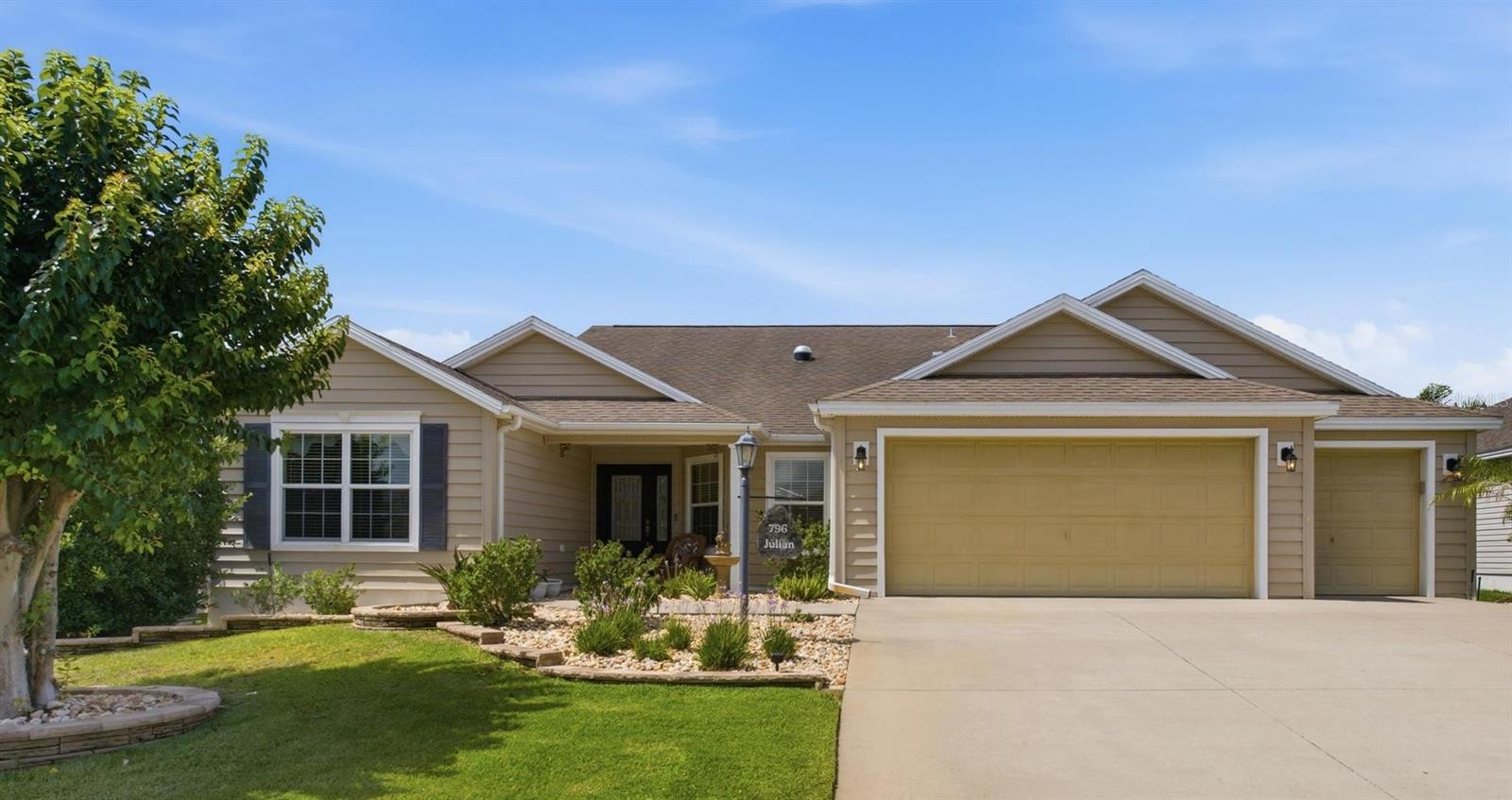 3/2 GARDENIA | GOLF CART GARAGE | NEW A/C 2023 | OVER 1,900 SQ FT | EXPANSIVE SCREENED LANAI | MINUTES TO LAKE SUMTER LANDING! Welcome to your Florida dream home in the highly sought-after Village of Hemingway, where every day feels like a vacation. Whether you're looking for a year-round residence, a seasonal escape from the cold, or an exceptional investment opportunity, this beautifully maintained Gardenia model checks all the boxes. Perfectly positioned just minutes from Lake Sumter Landing Market Square, Havana Country Club, and Kilimanjaro Golf Course, you'll enjoy endless opportunities for golf, dining, shopping, entertainment, and the unmatched lifestyle The Villages is known for. From the moment you arrive, you'll appreciate the home's inviting curb appeal, and desirable 2-car garage plus dedicated golf cart garage, making it easy to explore everything The Villages has to offer. Inside, the open and spacious floor plan is designed for both comfortable everyday living and effortless entertaining. The heart of the home features a beautifully appointed kitchen with granite countertops, abundant cabinetry, generous workspace, and overlooks the dining and living areas  bar so you'll never miss a conversation. There's also a dinette thats perfect for your morning conversations. The split-bedroom layout offers privacy for both owners and guests, while the spacious primary suite provides a relaxing retreat with tray ceilings, ample room for your furnishings, and an ensuite bath with 2 separate vanities, walk in shower, and 2 walk in closets. Bedroom #2 features a murphy bed and is perfect set up as an office or hobby room but can easily accomodate guests. Guest bath in between between bedroom 2 & 3 offers a shower/tub combo.  One of the standout features of this home is the incredible outdoor living space. The oversized screened lanai stretches nearly the entire length of the home, creating the perfect setting for morning coffee, afternoon reading, evening cocktails, or entertaining friends after a day on the golf course. An additional side screened lanai, previously used as a dog run, offers endless possibilities as a private garden, plant sanctuary, pet area, or extra outdoor storage space. Additional updates include a 2023 A/C, giving you peace of mind while enjoying the Florida sunshine. Whether you're escaping snowy winters, making The Villages your forever home, or searching for a property with excellent rental potential, this home offers the perfect combination of location, comfort, and lifestyle. Come discover why so many people fall in love with The Villages—and start making memories in a home where every day feels like you're on vacation.