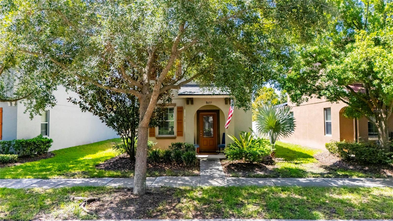 Welcome to this charming city-style home nestled within a sought-after GATED COMMUNITY of Magnolia Park in the heart of Tampa Bay. Offering 2 bedrooms, 2.5 bathrooms, and 1,360 square feet, this inviting home is perfectly positioned with quick access to I-75 and the Selmon Expressway, making commuting throughout the Tampa Bay area effortless. Enjoy the convenience of being just minutes from shopping, restaurants, hospitals, and only 35 MINUTES from Tampa International AIRPORT.

Step inside to discover TALL CEILINGS and beautiful engineered HARDWOOD floors throughout the first floor, creating a warm and welcoming atmosphere. The thoughtfully designed kitchen features GRANITE countertops, 42-inch cabinetry, and ample workspace, making it ideal for both everyday living and entertaining.

Upstairs, you'll find two spacious bedrooms, each offering comfort and privacy, while the convenient half bath downstairs is perfect for guests. Out back, the rear-entry garage is accessed by a private road, enhancing the home's charming streetscape and curb appeal.

Enjoy a truly LOW MAINTENANCE COMMUNITY, as the HOA takes care of all exterior landscaping, giving you more time to enjoy everything this vibrant community has to offer. Residents have access to 3 POOLS , a BASKETBALL COURT, and a SPLASHPAD, providing recreation and relaxation for all ages.

Nature lovers will appreciate LAKE CHERRYWOOD, located within the community, where breathtaking sunsets create the perfect backdrop for evening strolls and an abundance of Florida wildlife can be enjoyed year-round.

Whether you're a first-time homebuyer, looking to downsize, or searching for a low-maintenance home in a prime location, this home offers the perfect blend of cuteness, convenience, and community. Come experience all this beautiful home has to offer!