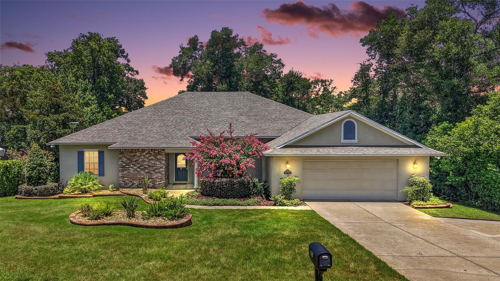 Nestled on a quiet dead-end street in one of Mount Dora's established neighborhoods, this beautifully maintained one-owner home offers the perfect combination of comfort, space, and Florida living. From the moment you arrive, you'll appreciate the inviting curb appeal, mature landscaping, and welcoming entrance.
Inside, the thoughtfully designed floor plan features spacious living areas filled with natural light, creating an open and inviting atmosphere for everyday living and entertaining. The tiled foyer welcomes you into the formal living and dining rooms. The spacious kitchen features abundant cabinetry, stainless steel appliances, a pantry, built-in desk, and generous counter space while overlooking the inviting family room with a cozy fireplace.
The main level offers a desirable split-bedroom floor plan, providing privacy for family and guests. The spacious primary suite features two walk-in closets, while the ensuite bath offers dual vanities, a walk-in shower, and a private water closet. The additional bedrooms are generously sized and share a guest bath with dual sinks, a linen closet, and a tub/shower combination. Sliding glass doors lead to a spacious air-conditioned lanai overlooking the backyard, creating additional year-round living space.
A rare feature for Florida homes, the finished 700± square-foot basement offers exceptional flexibility. Complete with a private entrance, enclosed lanai with its own dedicated mini-split HVAC system, and an ensuite bathroom, it is ideal for an in-law suite, guest quarters, home office, recreation room, or multi-generational living.

Step outside to your own private backyard retreat where you can relax, entertain, or simply enjoy the peaceful surroundings. The spacious yard offers plenty of room to add the pool of your dreams while still providing ample space for outdoor activities. Additional features include a whole-house generator for added peace of mind, 2 car garage and 1/3 acre lot. 
Conveniently located just minutes from historic downtown Mount Dora, you'll enjoy award-winning restaurants, boutique shopping, waterfront parks, year-round festivals, golf courses, and the Harris Chain of Lakes. With nearby medical facilities, schools, and major highways, this exceptional home offers the perfect blend of tranquility and convenience.
Don't miss this rare opportunity to own a meticulously cared-for home in one of Mount Dora's most desirable communities. The 2596 square footage is for the upsairs only. The downstairs/basement area is an additional 1000 square feet +/- including the lanai.