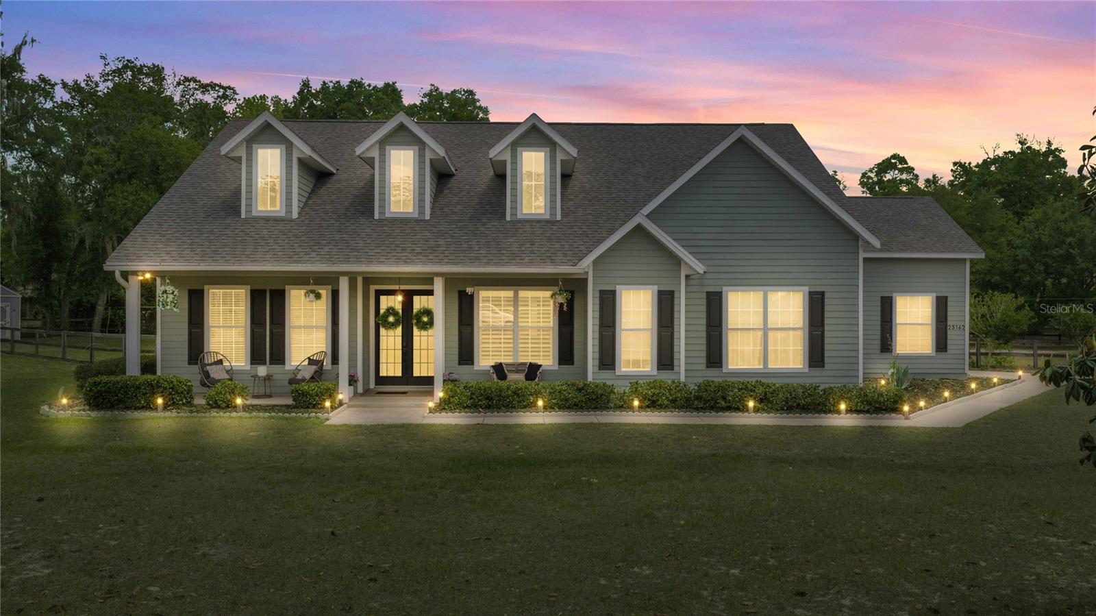 Back on market at no fault of the property or sellers. 
LUXURY, LOCATION, and ENERGY EFFICIENCY come together in this private slice of High Springs living — where comfort, modern upgrades, and natural beauty create the ideal North Florida lifestyle.

Nestled on a sprawling 1.8-acre corner lot in the desirable River Run Plantation, this captivating 3BR/2BA home with a sunroom and bonus room offers 2,529 square feet of thoughtfully designed living space. Surrounded by mature trees and open space, the setting provides both privacy and tranquility — with the added bonus of community river access just 1/10 of a mile away, all while being outside of a flood zone.

Inside, the home is filled with abundant natural light, soaring 10-foot ceilings, and elegant plantation shutters throughout. The fully renovated gourmet kitchen is a true centerpiece, featuring quartz waterfall countertops, a workstation sink, double ovens, and floor-to-ceiling soft-close cabinetry — perfect for both everyday living and entertaining.

Step outside to enjoy true indoor-outdoor living with a large patio overlooking a fenced backyard complete with a cozy fire pit and plenty of room to design your dream pool.

One of the standout features of this home is the state-of-the-art 16kW solar energy system that keeps electric costs exceptionally low — often eliminating the power bill entirely — offering long-term savings and energy independence without sacrificing comfort.

Additional major upgrades include a NEW ROOF (September 2023), 18 SEER AC with UV air scrubber (2020), and a whole-house RainSoft water treatment system plus reverse osmosis. 

Zoned for "A"-rated High Springs Community School and located just minutes from downtown High Springs, local springs, and an easy drive to Gainesville, this home offers the perfect balance of convenience, lifestyle, and efficiency.

If you’ve been looking for a move-in-ready home with modern upgrades, energy savings, and room to truly enjoy the outdoors — this one is a must-see. The property also includes a charming chicken coop, offering the opportunity to enjoy fresh eggs daily and embrace a relaxed, homestead-style lifestyle — all while still being just minutes from town.