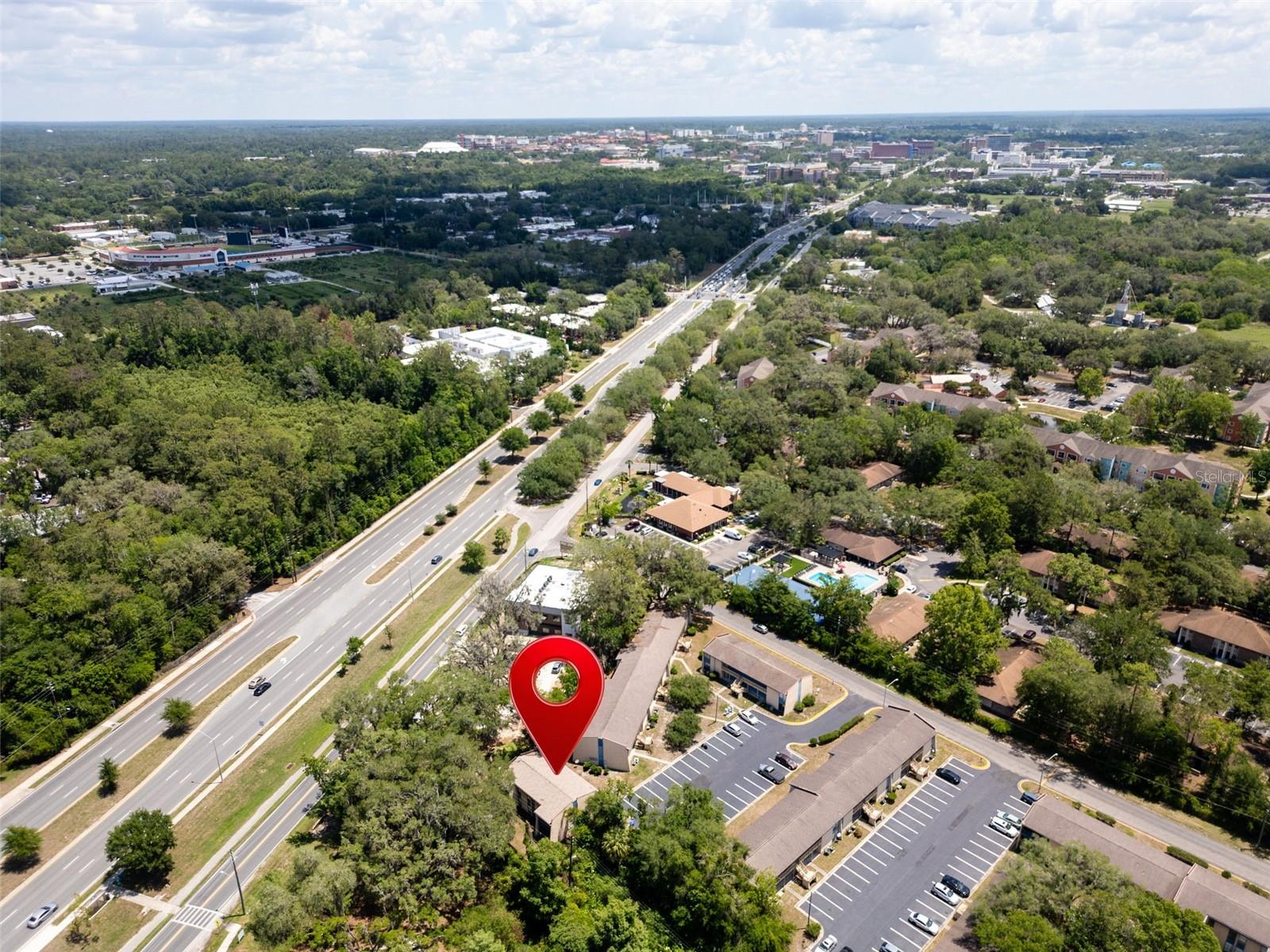 Discover convenient Gainesville living in this charming 2-bedroom, 1-bath condo located in the desirable Brandywine community! Just minutes from the University of Florida, Shands Hospital, VA Hospital, shopping, dining, and bus routes, this top-floor unit offers both comfort and convenience. Inside, enjoy an open-concept living and dining area with laminate flooring and abundant natural light. Community amenities include a pool, clubhouse, fitness area, game room, on-site laundry, and more. HOA fees include high-speed internet, water, exterior maintenance, and common area upkeep, making for low-maintenance living. Whether you're looking for a primary residence, student housing, or an investment opportunity, this centrally located condo is a must-see!
