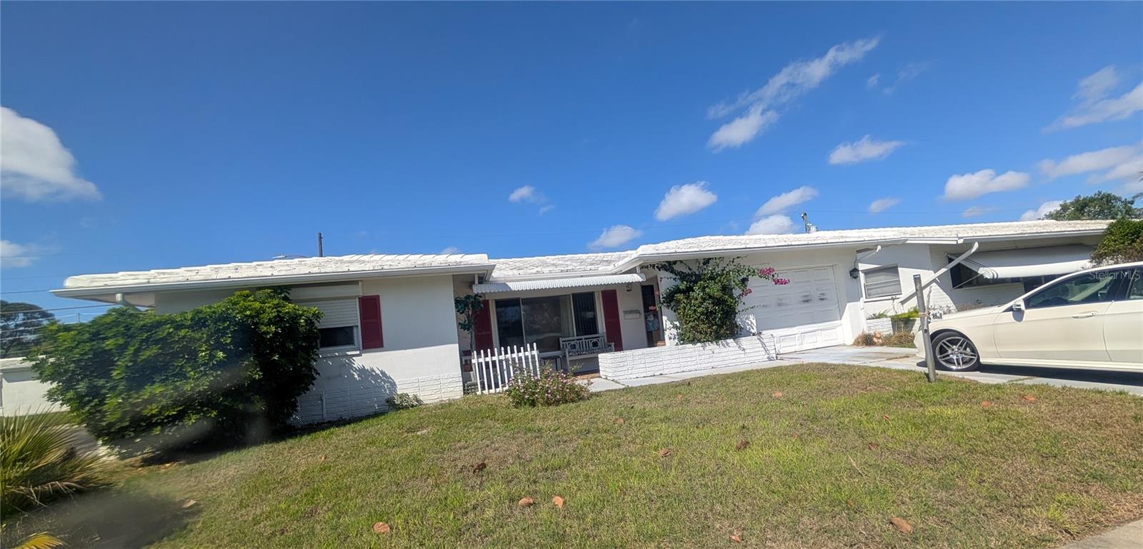 DIAMOND IN THE ROUGH! CASH ONLY! Strictly sold AS IS - FIXER-UPPER - large 1,587 htd. sqft "Eden Model" (floor plan attached) block home in desirable 55+ Mainlands of Tamarac By the Gulf (Unit 1-B) on corner lot, located close to entrance, Clubhouse with pool, and golf course, NO FLOOD ZONE. The HOA is responsible for the tile roof (2000) and this one is coming due (no assessment) - roof is still watertight. Rules: 2 extra large pets ok, 3-months minimum rental - once a year. New owners need to own at least for 1 year before they can rent the property. Low $488.32 monthly fee includes: water, sewer, trash, basic cable, all common areas & taxes, Clubhouse with pool, roads, lawncare, and more. Home features all NEWER WINDOWS, HURRICANE SHUTTERS, A/C in 2017 but will NEED ENTIRE INTERIOR UPDATES plus new garage door - no seller's disclosure available as PoA has never occupied the property. Master bedroom features its own bath with shower and a spacious walk-in closet. Come, hurry, take a look and make your cash offer - highest and best until June 10th, 2026.
