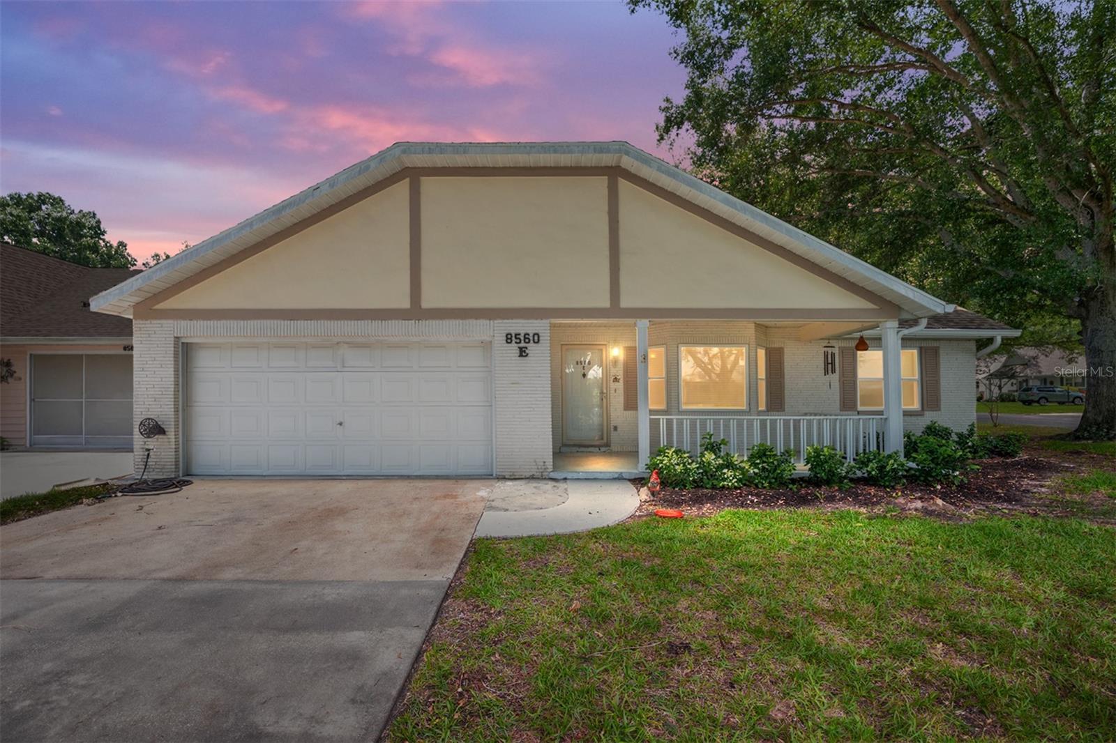 Welcome to this beautifully updated Augusta Model, the largest villa floor plan available in On Top of the World! This spacious end-unit home offers 2 bedrooms, 2 bathrooms, a 2-car garage, and a versatile den, providing plenty of room for comfortable living.
Step inside to discover brand-new tile flooring throughout, fresh interior paint, and the complete removal of popcorn ceilings for a clean, modern look. The expansive great room features soaring ceilings and a charming bay window that fills the space with natural light.
The kitchen offers an eat-in dining area and opens to an extended enclosed lanai, creating additional living space perfect for relaxing, entertaining, or enjoying your morning coffee year-round.
The generous primary suite includes his-and-hers closets, a double vanity, and ample space for a sitting area. The guest bedroom and bath provide privacy and comfort for visitors. Major updates provide peace of mind, including a 2021 roof, 2020 HVAC system, new double-pane windows (2024), and new tile flooring throughout the home (2024). Additional highlights include the extended enclosed lanai and spacious 2-car garage.