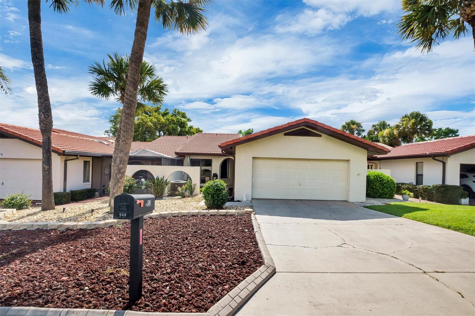 Welcome to 503 Clubhouse Drive in the desirable Lake Wales Country Club. This 2-bedroom, 2-bath villa with a 2-car garage is an excellent opportunity for buyers looking to add their own style while enjoying golf course living.

The home features a spacious floor plan, gas range, an enclosed lanai, an automatic retractable awning, and a brick paver patio—perfect for relaxing or entertaining. Mature trees provide privacy and a peaceful setting along the golf course. Community pool.

Whether you're looking for a full-time residence, seasonal retreat, or investment property, this is your chance to own in one of Lake Wales' most established golf course communities at an attractive price.

Centrally located between both east and west coast beaches as well as  easy access to Tampa and Orlando Airports.