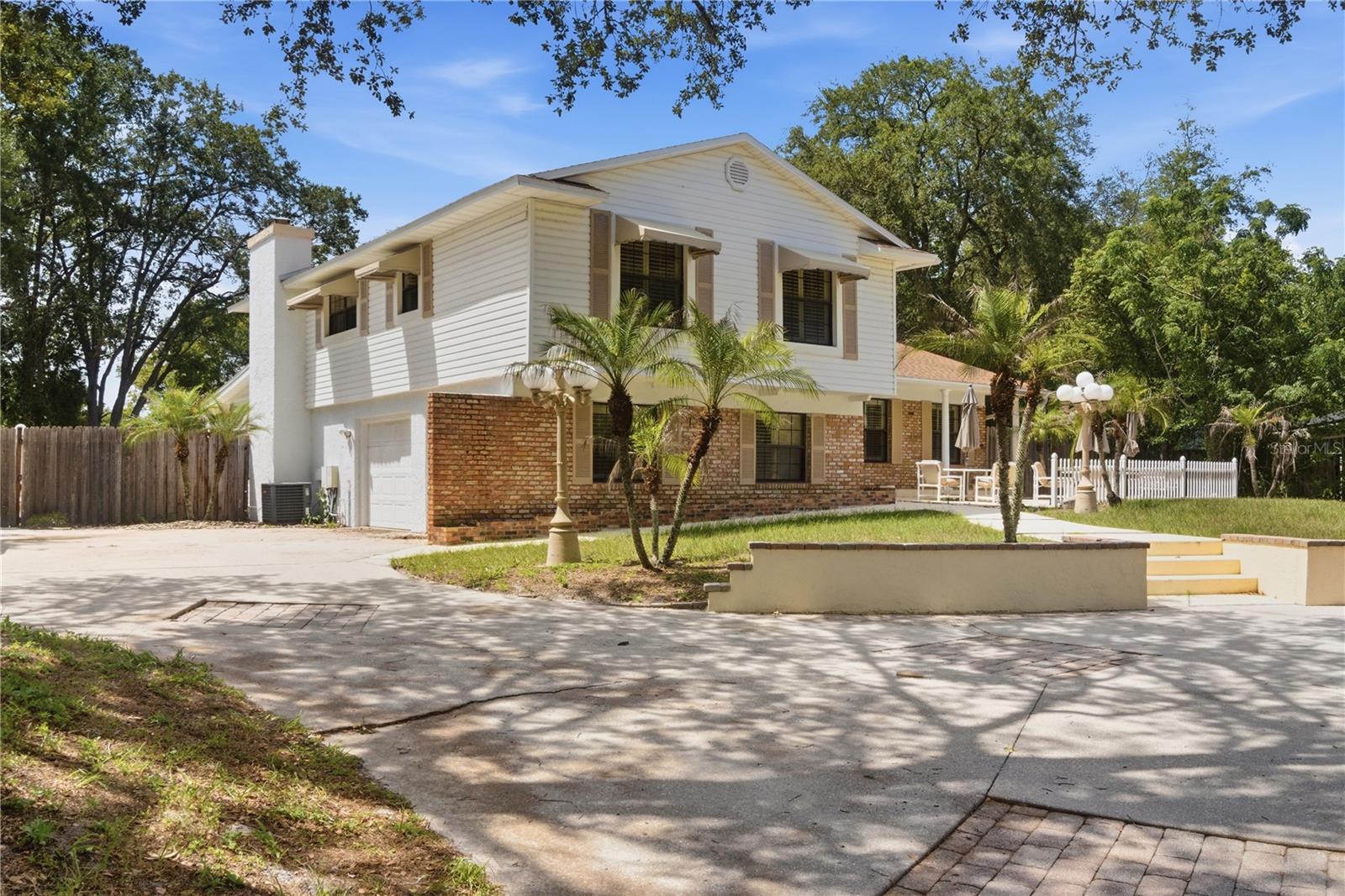 Rare opportunity in the heart of Winter Springs! Situated on an expansive 0.72-acre lot with NO HOA, this unique 4-bedroom, 2.5-bath pool home offers endless potential for the buyer seeking space, privacy, and the chance to create something truly special. The property features a recently resurfaced pool, a fully fenced backyard, and an incredible outdoor setting designed for entertaining and enjoying Florida living. One of the standout features is the detached pizza kitchen gazebo, perfect for hosting family and friends, along with an additional outbuilding complete with A/C, power, and plumbing—ideal for a workshop, studio, home office, hobby space, or future guest accommodations. Mature landscaping and abundant outdoor space provide room for recreation, gardening, boats, RVs, and more. Inside, the home offers a functional layout with tremendous upside. While cosmetic updates could enhance the property's full potential, the major features, lot size, and unique amenities make this a rare find in Winter Springs. Whether you're looking for a personal residence, multi-generational living setup, or an investment opportunity, this property is ready for your vision.