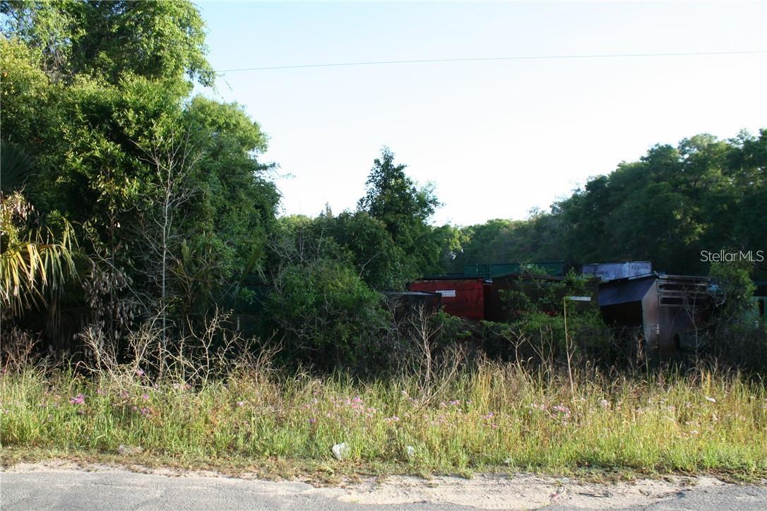 Ideal location for big box, storage facilities, etc. Property is an inheritance therefore Seller has very little if any knowledge of vacant land. Sold As-Is with Right to inspect due to Seller not having knowledge enough to offer Seller Disclosure. Presently has neighbor renting a portion of the property but can vacate immediately. Located approximately 150' off Hwy. 441/27/301. Intersection at Hwy and 95th St. is Traffic signal controlled with turn lanes allowing easy ingress egress to 95th St. which is a dead-end street with limited traffic for easy access to and from property. Approximately 10 minutes to City limits of Ocala and located just north of Belleview.