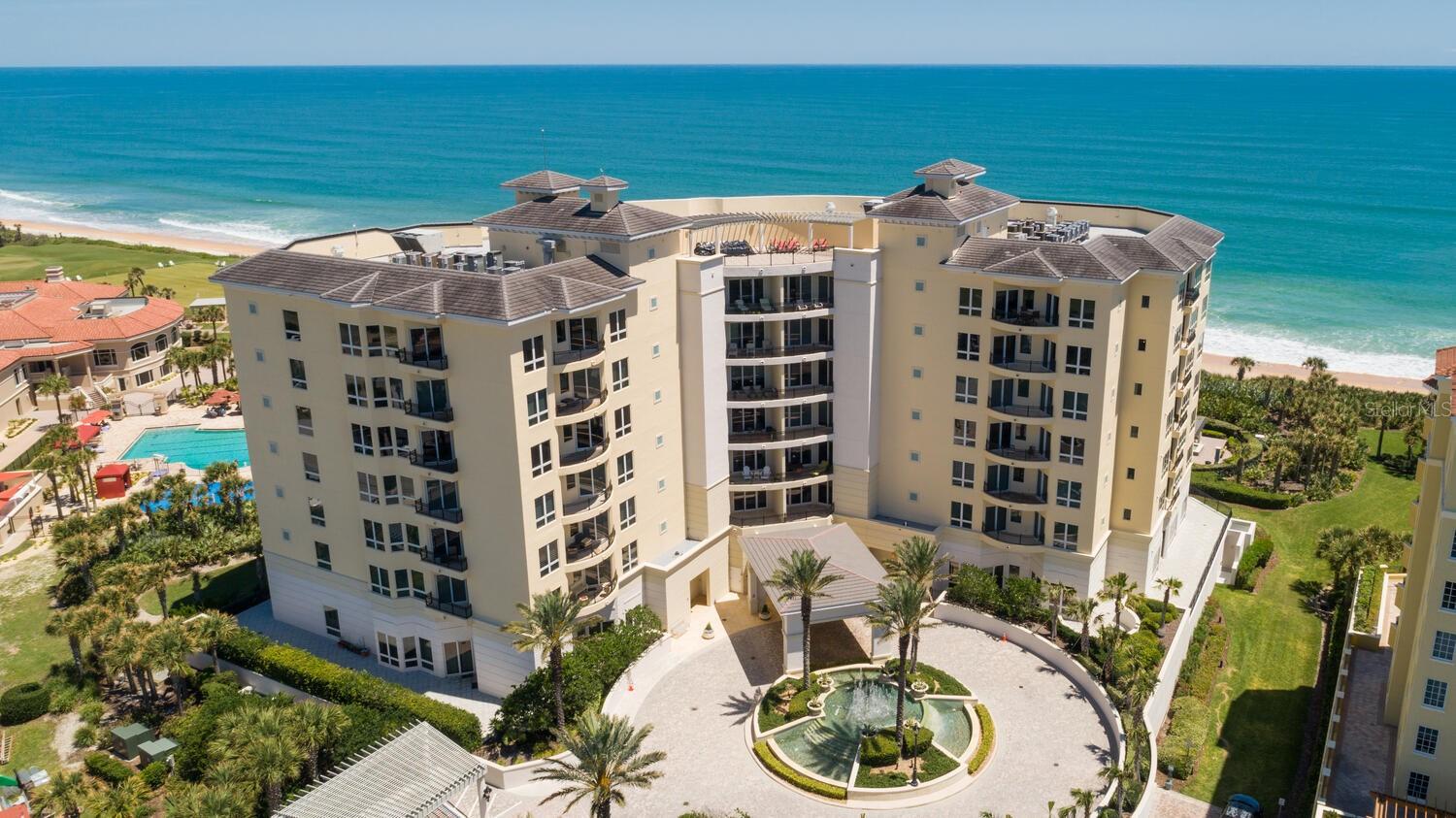DIRECT OCEANFRONT LUXURY CONDO-Le JARDIN 304, HAMMOCK DUNES.  This stunning 4-bedroom, 4.5-bathroom southern end unit has been remodeled with sleek contemporary finishes and high-end fixtures to create a refined ambiance and modern sophistication throughout. Spanning 4,983 square feet, every inch of this residence has been redesigned for elegance and comfort. Considerable windows, large balconies and an open floor plan showcase breathtaking ocean views, flooding the expansive living spaces with natural light.  The remodeled modern kitchen was designed by award winner Rob Turner of CRT Studio utilizing quartzite counters and walnut cabinetry - a true masterpiece with gas cooktop, wine cooler and Viking appliances.  The Primary Suite has outstanding ocean views and features a Zebrawood wall with Restoration Hardware lighting.  Its exquisite bathroom offers a dual luxury space with a joined steam shower, onyx countertops and Jerusalem limestone floor and tile creating a spa-like retreat.  Impressive dual custom walk-in closets too.  The Great Room and Dining Room are the ultimate gathering space with an expansive balcony and floor to ceiling windows overlooking the Atlantic Shoreline. Three luxurious guest ensuites are featured with oversized king proportions and balconies. Exquisite appointments include: private elevators, a large oceanfront office, a private and enclosed 2 car garage & storage area, Crèma Marfil stone flooring, onyx fireplace surround, 10’ ceilings and more.  
Le Jardin was designed and built to accommodate the most discriminating buyer. It sits next to the Hammock Dunes Club with only 26 residences and 7 stories.  Wine cellar, theater room, fitness center with resistance pool, steam and sauna, roof top observation deck, fire pit, oversized spa, gardens, dune walkover to the beach - the true measure of oceanfront luxury.  
Purchase of the Hammock Dunes Club Membership is available but not required. Recognized as one of the world's top Private Clubs, Hammock Dunes is an award-winning Oceanfront Club with 2 Audubon Certified golf courses, oceanfront clubhouse, pool, 5,000sf fitness center, croquet, social activities and more!  Wonderful dining options such as Elegant Oceanfront Dining, The Dunes Tavern, Alfresco Dining, Low Country Style Dining.  Enjoy our small town with its quiet, pristine beaches while big city life in Jax or Orlando is just 1 hour away. Call for a private tour today!