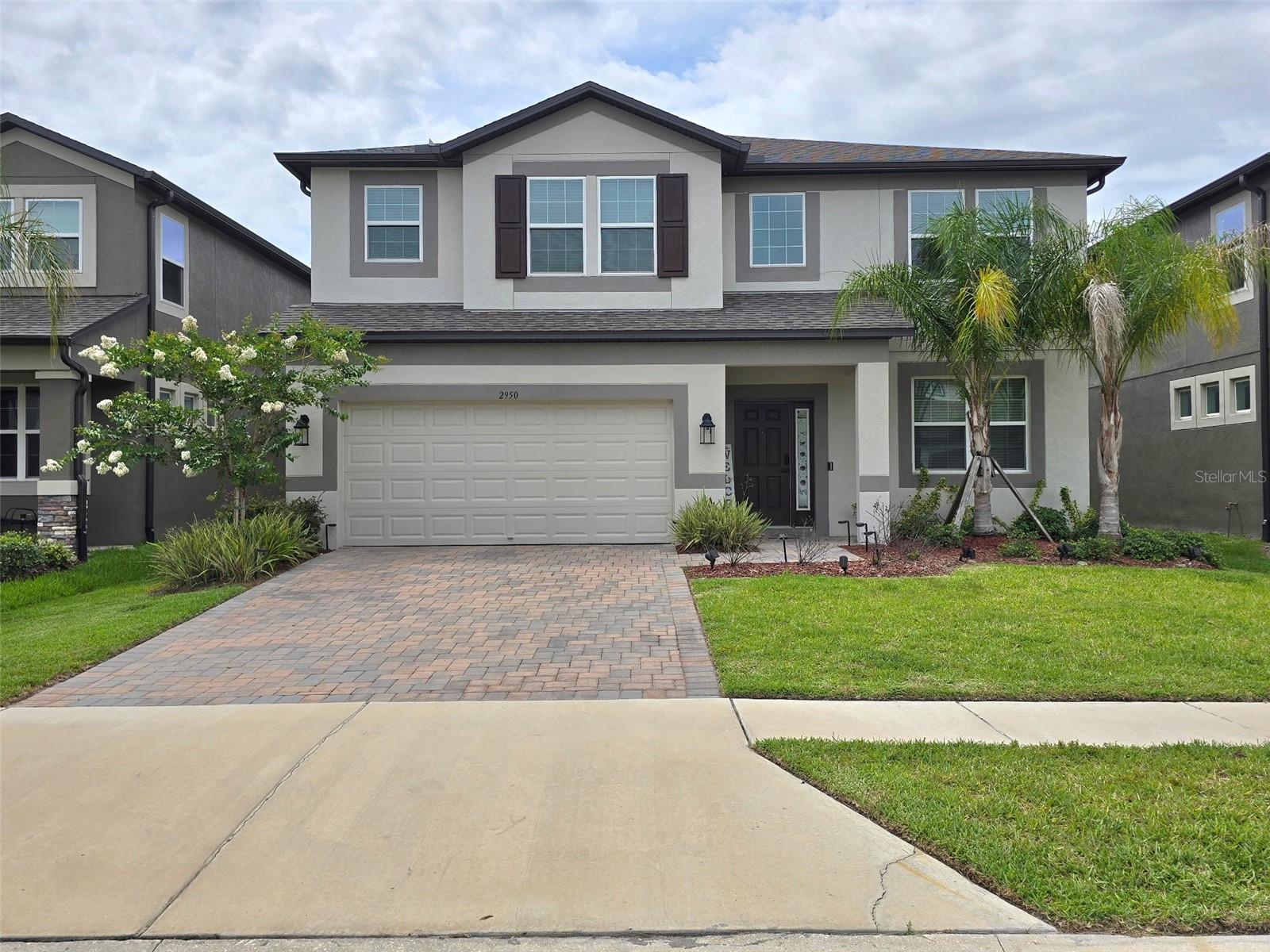 Welcome to this beautifully maintained two-story home that perfectly blends space, comfort, and functionality. Located in one of Tampa's most desirable growing communities, this impressive residence offers exceptional living areas, thoughtful design, and outstanding indoor-outdoor living.The home's attractive curb appeal begins with a paver driveway, mature landscaping, a three-car garage, and a welcoming front entry. Inside, you'll find a bright and open floor plan designed to accommodate both everyday living and entertaining.The entire first floor features durable tile flooring, creating a seamless flow throughout the main living spaces. Just off the foyer, a versatile flex room provides endless possibilities and can easily serve as a home office, study, playroom, or additional sitting area.At the heart of the home is a spacious gourmet kitchen featuring abundant cabinetry, stainless steel appliances, generous counter space, and a large center island with seating. The kitchen opens effortlessly to the dining area and family room, creating the perfect gathering space for family and friends.A dedicated coffee station located just beyond the kitchen adds both convenience and charm, offering additional storage and a designated area for beverages and small appliances.The spacious family room is filled with natural light and overlooks the covered screened lanai, creating a seamless connection between indoor and outdoor living. Whether enjoying your morning coffee or hosting guests, this outdoor space is ideal for year-round Florida living.The first floor also includes a private guest bedroom with convenient access to a full bathroom, making it perfect for visitors or multigenerational living. A generously sized laundry room provides additional storage and functionality.Step outside to enjoy a fully fenced backyard with ample green space, offering privacy, room for pets, outdoor activities, future landscaping projects, or even the addition of a pool. Wide side yards further enhance the sense of space and openness around the property.Upstairs, you'll find plush carpeting throughout and an exceptionally spacious Owner's Suite designed as a true retreat. Featuring a tray ceiling, abundant natural light, a large walk-in closet, and a well-appointed en-suite bathroom with dual vanities, separate shower, and ample storage, this private sanctuary offers both comfort and elegance.Three additional generously sized bedrooms provide flexibility for family members, guests, or home office needs. A large shared bathroom serves the secondary bedrooms with ease.One of the home's standout features is the oversized Game Room, a versatile space ideal for a media room, home theater, fitness area, playroom, or secondary family lounge. Its generous dimensions allow endless possibilities to fit your lifestyle.Residents of this wonderful community enjoy access to resort-style amenities, including community pools, recreational areas, and beautifully maintained green spaces, creating an exceptional lifestyle experience for families of all ages.Combining spacious living areas, a functional floor plan, abundant natural light, and access to outstanding community amenities, this home offers a rare opportunity to enjoy.
Three-Car Garage, Resort-Style Community Amenities Including Pools and Recreational Areas, This move-in-ready home offers the perfect combination of space, comfort, and lifestyle in one of Tampa's most sought-after communities.