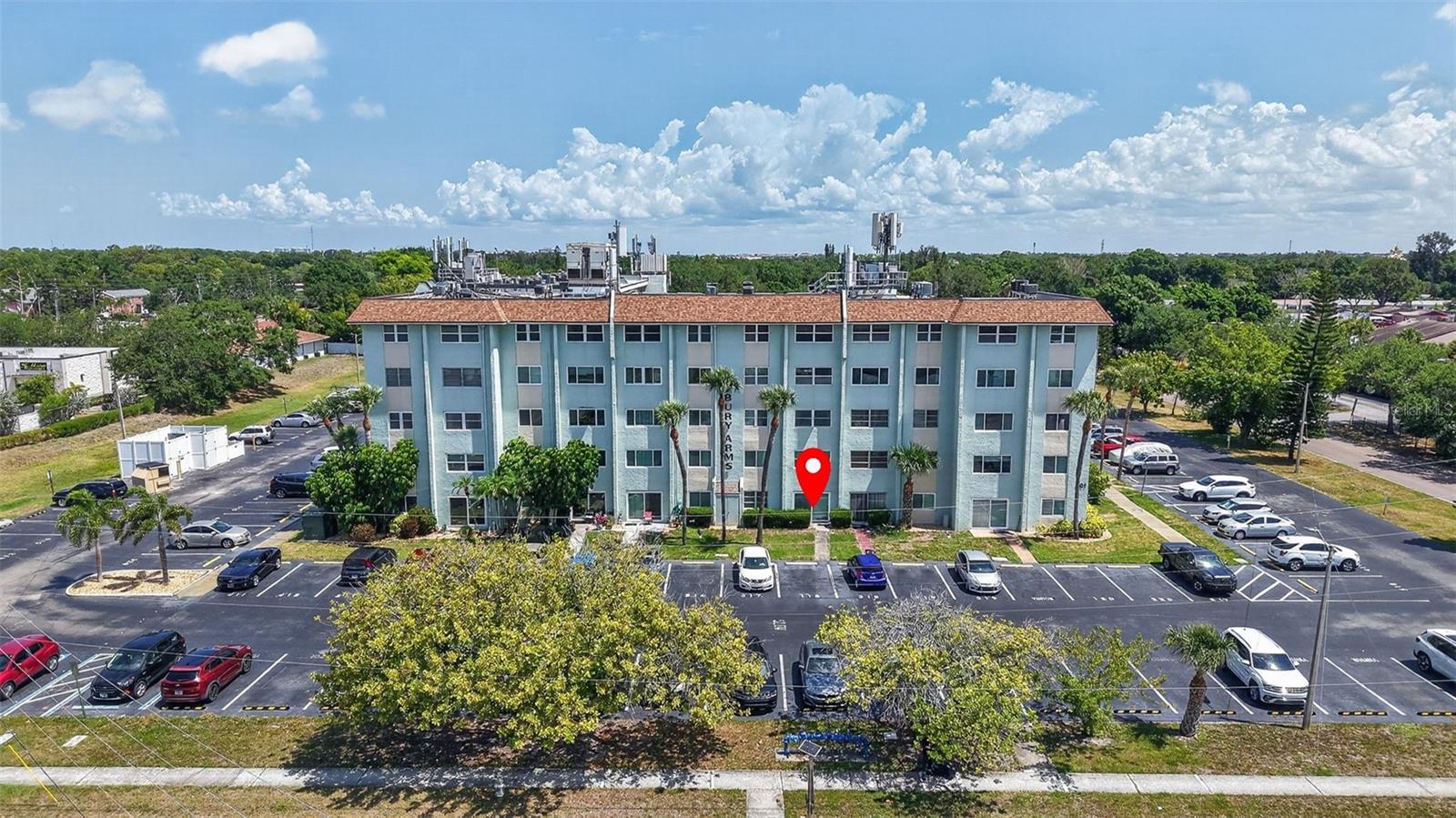 Welcome to your ultimate Florida oasis. This beautifully maintained, 2-bedroom, 2-bathroom ground-floor condominium in St. Petersburg offers the best of low-maintenance, turnkey living. Designed for modern comfort and accessibility, this move-in-ready residence features a dedicated parking space directly outside your private sliding back door, providing effortless entry without the need for stairs or elevators. The sun-lit interior has been meticulously cared for, and you are just steps away from the community swimming pool, shuffleboard court, and central courtyard. The association currently operates under the 80/20 rule, meaning buyers under the age of 55 are welcome to purchase and reside here, subject to approval. Residents enjoy top-tier amenities including a heated pool, clubhouse, shuffleboard courts, and a barbecue area. For your peace of mind, the monthly association fee covers water, sewer, trash, high-speed internet, premium cable TV, and exterior maintenance. The prime location is close to Target, Publix, and local dining. You are also just a short drive from downtown St. Petersburg and world-renowned Gulf Coast beaches. Whether you are looking for a full-time residence or a winter retreat, this ground-floor gem offers unparalleled convenience. Please contact me today to schedule your private walkthrough.
