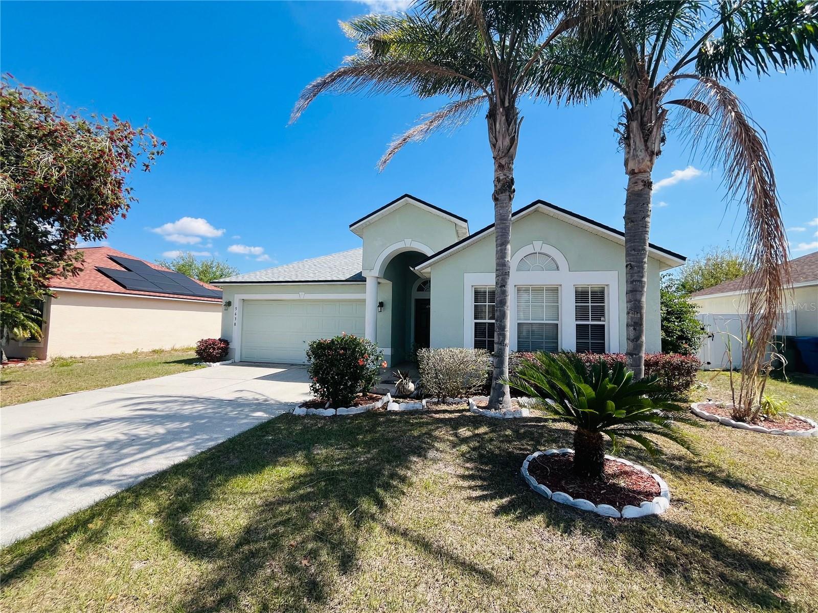 Welcome to 5638 Royal Hills Street, where comfort, space, and everyday convenience come together in one exceptional Winter Haven home.

Nestled within the established Royal Hills community, this beautifully maintained 4-bedroom, 2-bath residence offers over 2,000 square feet of thoughtfully designed living space, providing the perfect setting for growing families, entertaining guests, or simply enjoying the lifestyle you've been searching for.

From the moment you step inside, you'll appreciate the home's spacious and versatile layout. The formal living and dining areas create an elegant first impression, while the expansive family room opens seamlessly to the kitchen, making it easy to stay connected whether you're hosting holiday gatherings or enjoying a quiet evening at home. The kitchen is a true centerpiece, featuring abundant cabinetry, generous counter space, a breakfast bar, and a sunny dinette area perfect for morning coffee or casual meals.

This floor plan offers privacy and functionality, with the owner's suite serving as a relaxing retreat. Spacious secondary bedrooms provide flexibility for family members, guests, a home office, or hobby space.

Step outside to discover a fully fenced backyard designed for both relaxation and play. Whether you're envisioning summer barbecues, a play area for children or pets, or simply a peaceful place to unwind, this outdoor space offers endless possibilities. Additional features such as gutters, a water softener system, and mature landscaping add value and convenience.

Located just minutes from Highway 27, shopping, dining, medical facilities, and major commuter routes, this home delivers the perfect balance of neighborhood charm and accessibility. Royal Hills is known for its pride of ownership and welcoming atmosphere, making it a place you'll be proud to call home.

If you've been searching for a move-in-ready home with generous living space, a functional floor plan, and a location that keeps you connected to everything Central Florida has to offer, 5638 Royal Hills Street deserves a place at the top of your list. Schedule your private showing today and discover why this could be the forever home you've been waiting for.