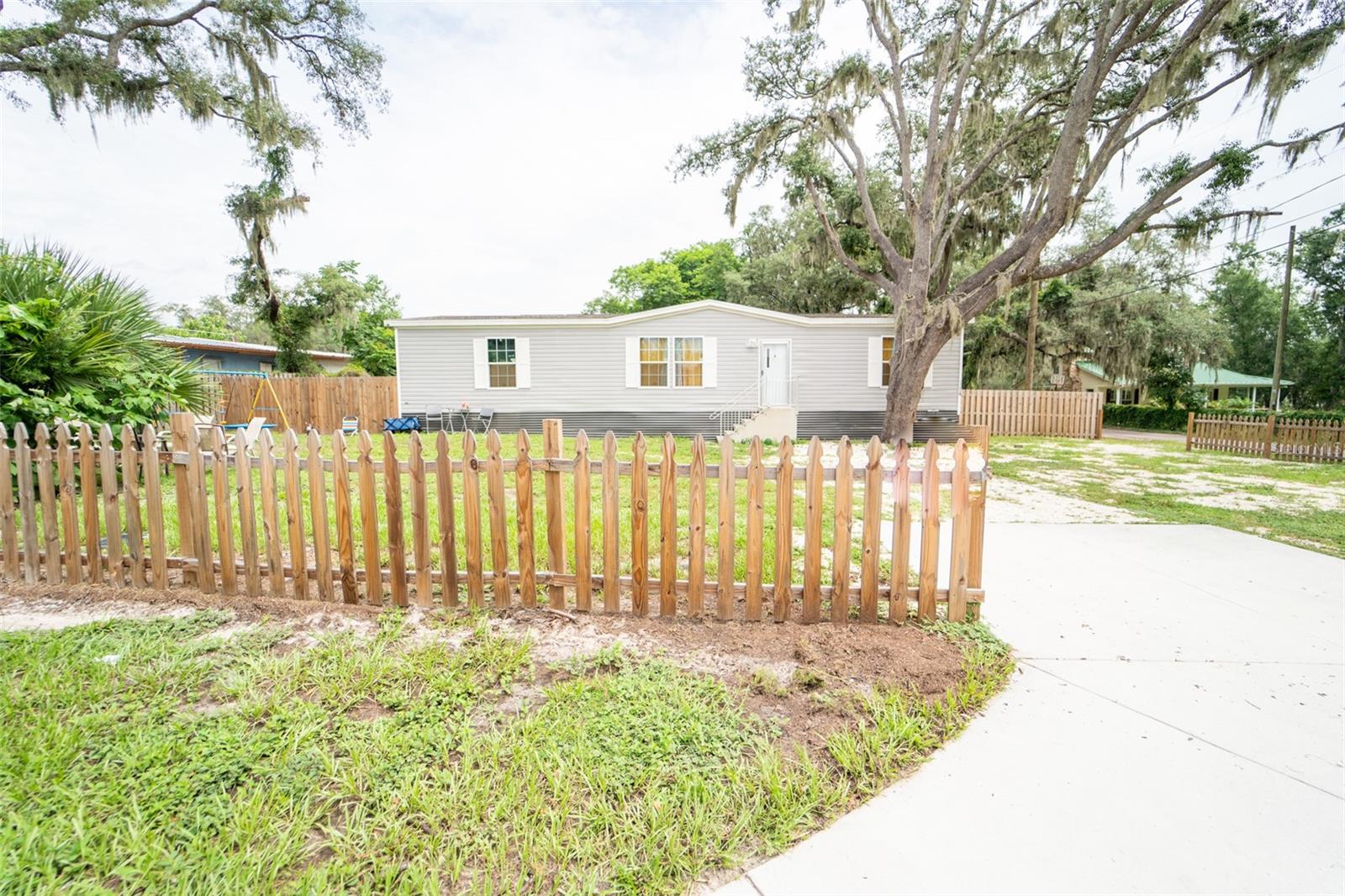 OPPORTUNITY IS KNOCKING! Don't miss your chance to own this high and dry almost ½-acre property with the FREEDOM of NO HOA, offering endless possibilities for investors, multi-generational living, or homeowners looking to offset their mortgage with rental income.

This unique property features two separate homes:

Primary Home: Built in 2022, offering 1,512 square feet with 3 bedrooms and 2 bathrooms.
Second Home: Built in 2018, featuring 798 square feet with 2 bedrooms and 1 bathroom.

Whether you're looking for a double rental investment, a place to live while generating income from the second home, or accommodations for extended family, this property delivers flexibility and value.

RECENT IMPROVEMENTS INCLUDE A BRAND-NEW STATE OF THE ART SEPTIC SYSTEM INSTALLED LARGE ENOUGH TO ACCOMODATE BOTH HOMES PLUS AN ADDITIONAL RV, ALONG WITH TWO SEPARATE 200-AMP ELECTRICAL PANELS IN 2024 PROVIDING INDEPENDANT SERVICE FOR EACH HOME!

The oversized entrance easily accommodates large RVs, boats, trailers, and additional vehicles, with plenty of parking and room to spread out. Enjoy the freedom of country-style living without HOA restrictions while remaining conveniently close to shopping, dining, schools, and major roadways.

Properties offering this combination of two newer homes, income potential, modern infrastructure, and NO HOA are rare—schedule your private showing today!