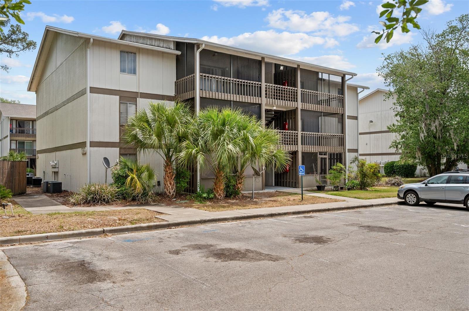 Tucked behind The Oaks Mall Plaza and just off Newberry Road, this 1-bedroom, 1-bath condo puts you in the middle of everything Gainesville has to offer. At 702 square feet under air, plus a screened balcony that brings the total to 752, this unit is bright, efficient, a short walk to the community pool. You're less than half a mile from North Florida Regional Medical Center, minutes from UF, Shands, and Santa Fe College, and right on the city bus line. Shopping, dining, and I-75 access are all within reach. Solid bones, great location, priced to move.