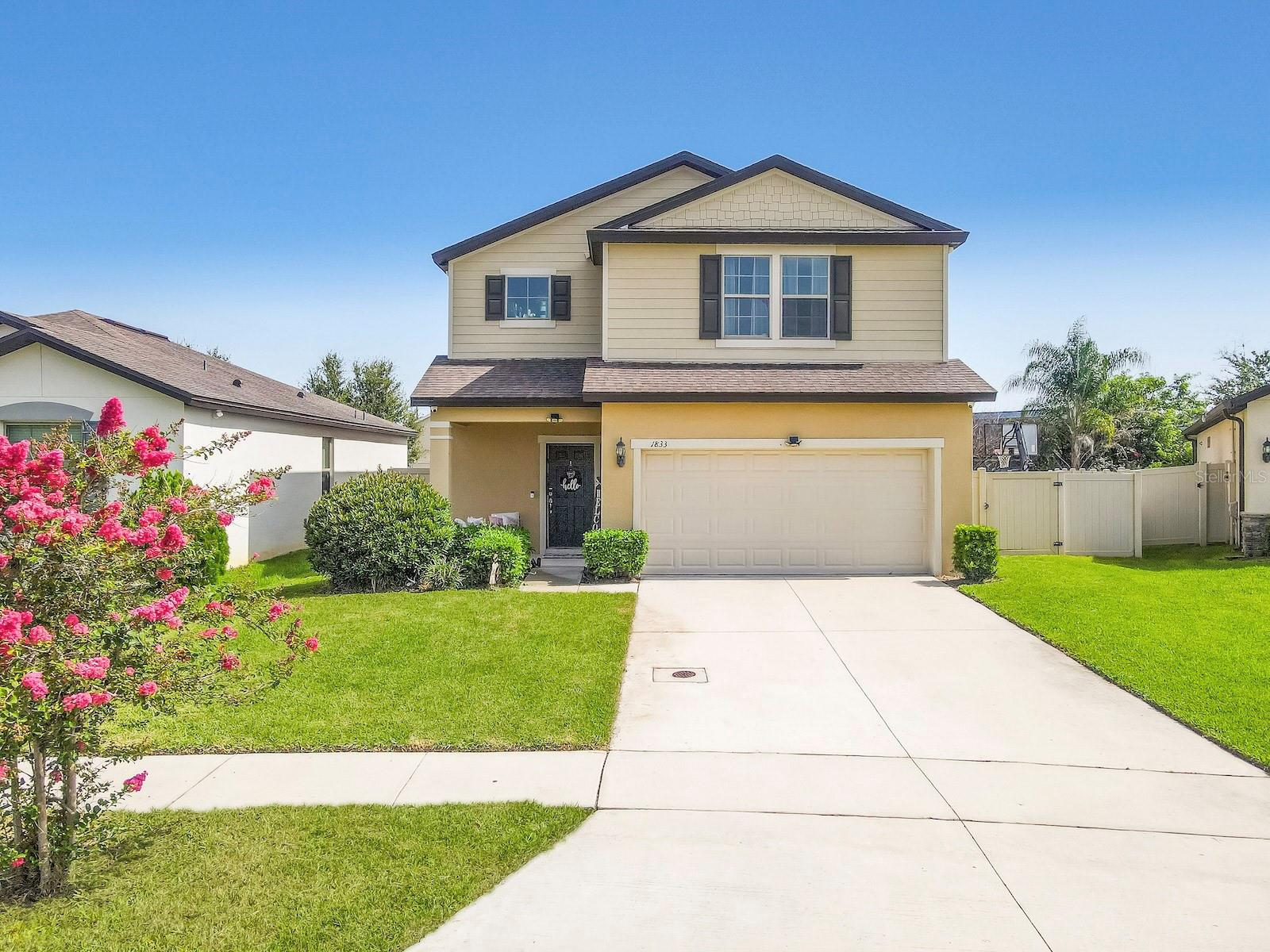 Welcome to 1833 Cayman Cove Circle in St. Cloud, located in the desirable Sunbrooke community. Built in 2020, this well-maintained two-story home offers 3 bedrooms, 2.5 bathrooms, a versatile flex room, loft, and approximately 2,143 square feet of living space. The open-concept floor plan features a spacious kitchen overlooking the gathering room and dining area, making it ideal for everyday living and entertaining. The kitchen offers ample cabinet and counter space, a center island, and stainless steel appliances. Upstairs, the loft provides additional living space perfect for a home office, media room, or play area. The primary suite includes a walk-in closet and an en-suite bathroom with dual vanities and a walk-in shower. Additional features include an inside laundry room, two-car garage, covered lanai, and a fully fenced backyard. Conveniently located near US-192, Florida's Turnpike, Lake Nona, Medical City, Orlando International Airport, shopping, dining, schools, and Central Florida attractions. This home offers modern living in a growing St. Cloud community. Schedule your private showing today.