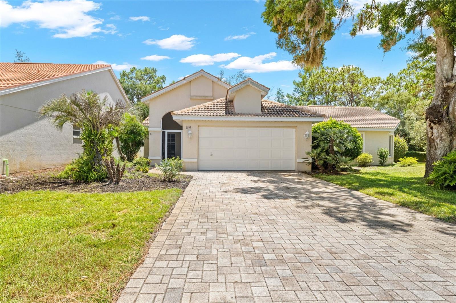 Short Sale. PRIVATE POOL HOME IN THE PRESTIGIOUS GLENLAKES GOLF & COUNTRY CLUB COMMUNITY! Welcome to 9354 Mississippi Run, a beautifully maintained residence offering 3 BEDROOMS, 2 BATHROOMS, AND 2,375 SQUARE FEET OF LIVING SPACE in one of Hernando County's most sought-after gated communities.

From the moment you enter through the impressive double-door entry, you'll appreciate the spacious open floor plan, soaring ceilings, abundant natural light, and inviting atmosphere throughout. Designed for both comfortable everyday living and effortless entertaining, this home features a spacious family room, elegant dining area, and an open-concept kitchen that serves as the heart of the home.

The generous owner's suite provides a relaxing retreat with a walk-in closet and a spacious ensuite bathroom featuring dual vanities, a soaking tub, and separate shower. A second bedroom and full bath offer comfortable accommodations for guests or family members.

Step outside and discover your own private Florida oasis. The SCREENED, HEATED IN-GROUND POOL is the centerpiece of the backyard, creating the perfect setting for relaxing, entertaining, or enjoying the Florida sunshine year-round. The attractively landscaped yard is designed for low-maintenance living and features a fenced rear yard for added privacy.

Additional highlights include a WOOD-BURNING FIREPLACE, stylish lighting, spacious living areas, and a desirable single-story layout. Residents of GlenLakes enjoy access to outstanding amenities including a 24-HOUR GATED ENTRANCE, CHAMPIONSHIP GOLF COURSE, CLUBHOUSE, FITNESS CENTER, TENNIS COURTS, DOG PARK, HEATED COMMUNITY POOL, AND AN ACTIVE SOCIAL CALENDAR.

Conveniently located near shopping, dining, medical facilities, Weeki Wachee Springs, the Gulf Coast, and the Suncoast Parkway, this home offers the perfect blend of luxury, security, and convenience. SHORT SALE OPPORTUNITY! Take advantage of the chance to own a spacious pool home in one of Hernando County's most desirable gated golf course communities. Sale is subject to lender approval.

Schedule your private showing today and experience the GlenLakes lifestyle for yourself.