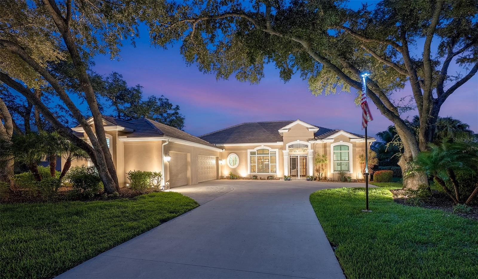 This custom-built lake front home is a great example of southern charm. It sits on a canopied tree street leading to its long driveway encompassed in majestic oaks and palms. Once through the double glass door entry you see straight through to vanishing glass doors opening to its extensive views. Magnificent triple-tray ceilings, archways, decadent moldings and layered crown moldings set the standards for this home. The split floor plan features two primary suites plus two more bedrooms, a formal dining room, formal living room and a great room with gas fireplace. The kitchen has granite, an island, 42-inch hardwood cabinets and updated appliances fit for the best Chef! The breakfast nook has an oversized aquarium window to take in the surroundings. Multiple entrances (including both primaries) open to the large lanais where you can sit in your heated pool and spa and also enjoy private preserve and lake views. (The lanai is wired and plumbed for a summer kitchen.) This home features plantation shutters, Low E impact windows, lanai shutters, whole house natural gas generator and recent roof. Come, play golf, pickleball, tennis, enjoy fitness or just collect seashells on the beach. Boca has two dog parks for our most precious family members. Soon Boca Royale’s gates will open in Wellen Park for dining, shopping and ballpark. Start the grand genteel life many only dream about, today!