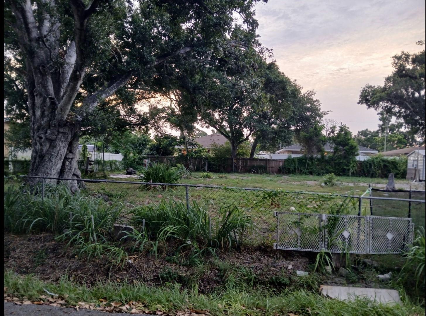 Build your dream home in the heart of Sarasota. This nearly half acre lot on a residential street is in an ideal location. The land did have a home that has been removed.
House has a well, with city water in the street. Sewer line is already in place as is electrical. Fully fenced, bring your plans!
